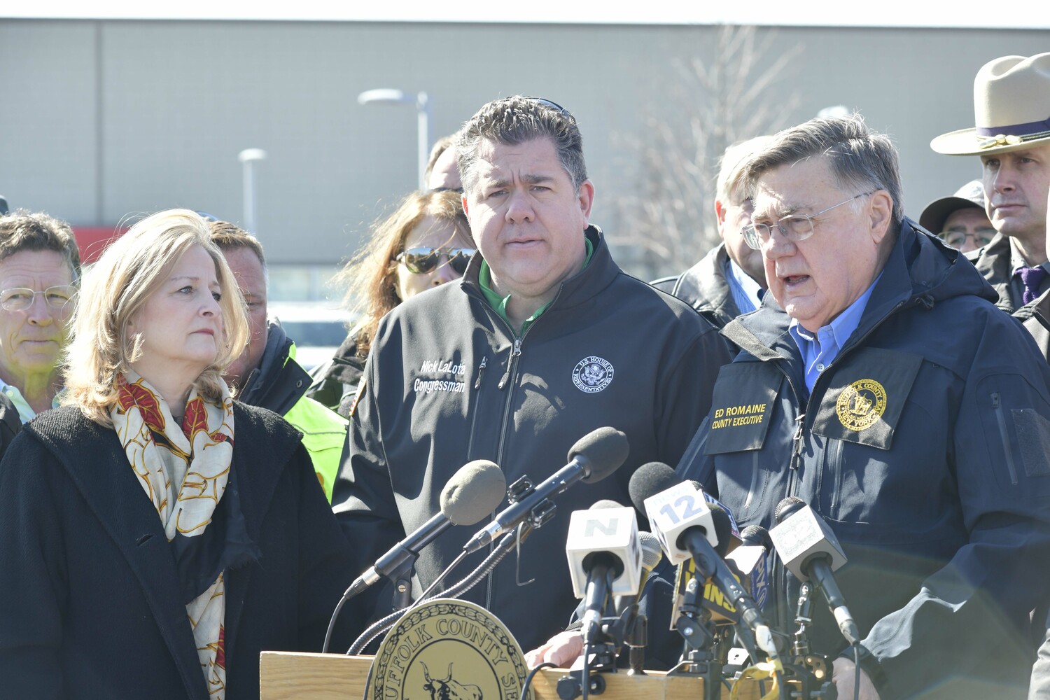 Southampton Town supervisor Maria Moore, Congressman Nick LaLota and Suffolk County Executive Ed Romaine at a press conference at Gabreski airport on Sunday.    DANA SHAW