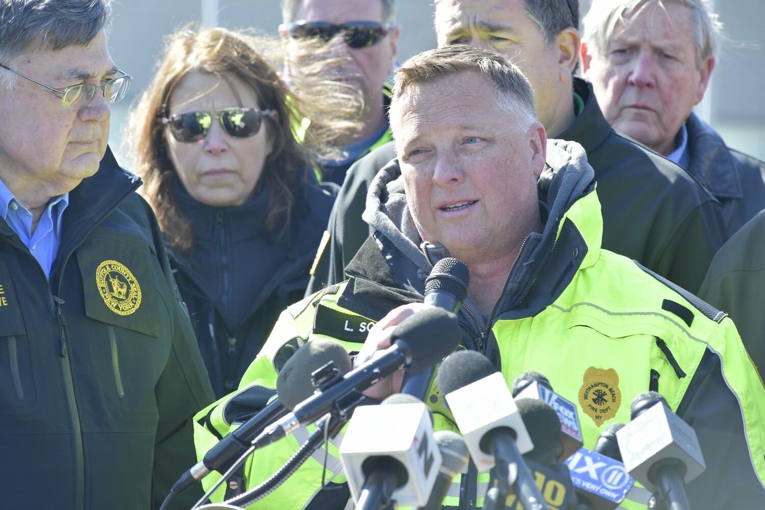 Lewis Scott, second assistant chief of the Westhampton Beach Fire Department gives an update at a press conference at Gabreski Airport on Sunday.  DANA SHAW