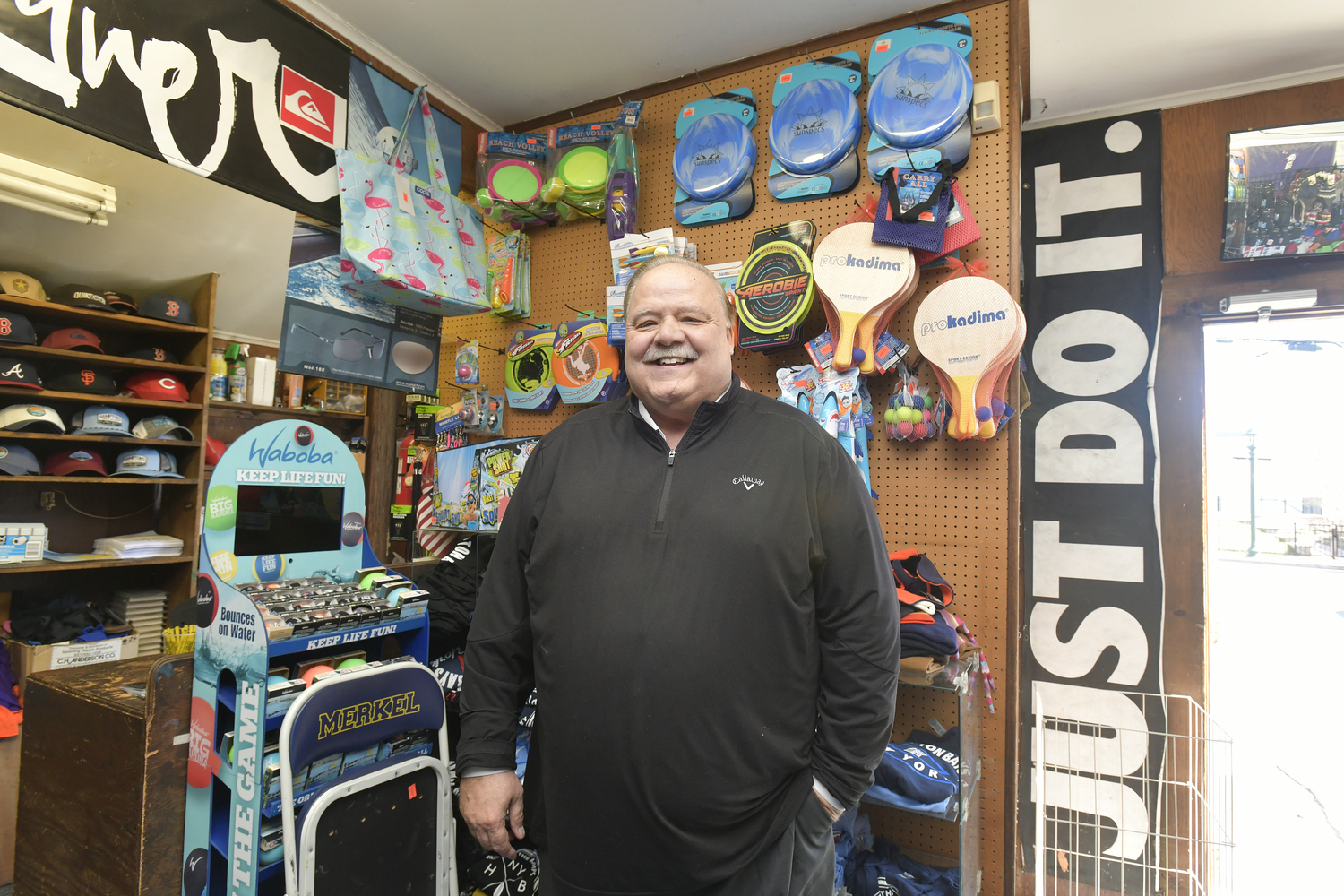 Rick Martel in his store on Election Day.  DANA SHAW