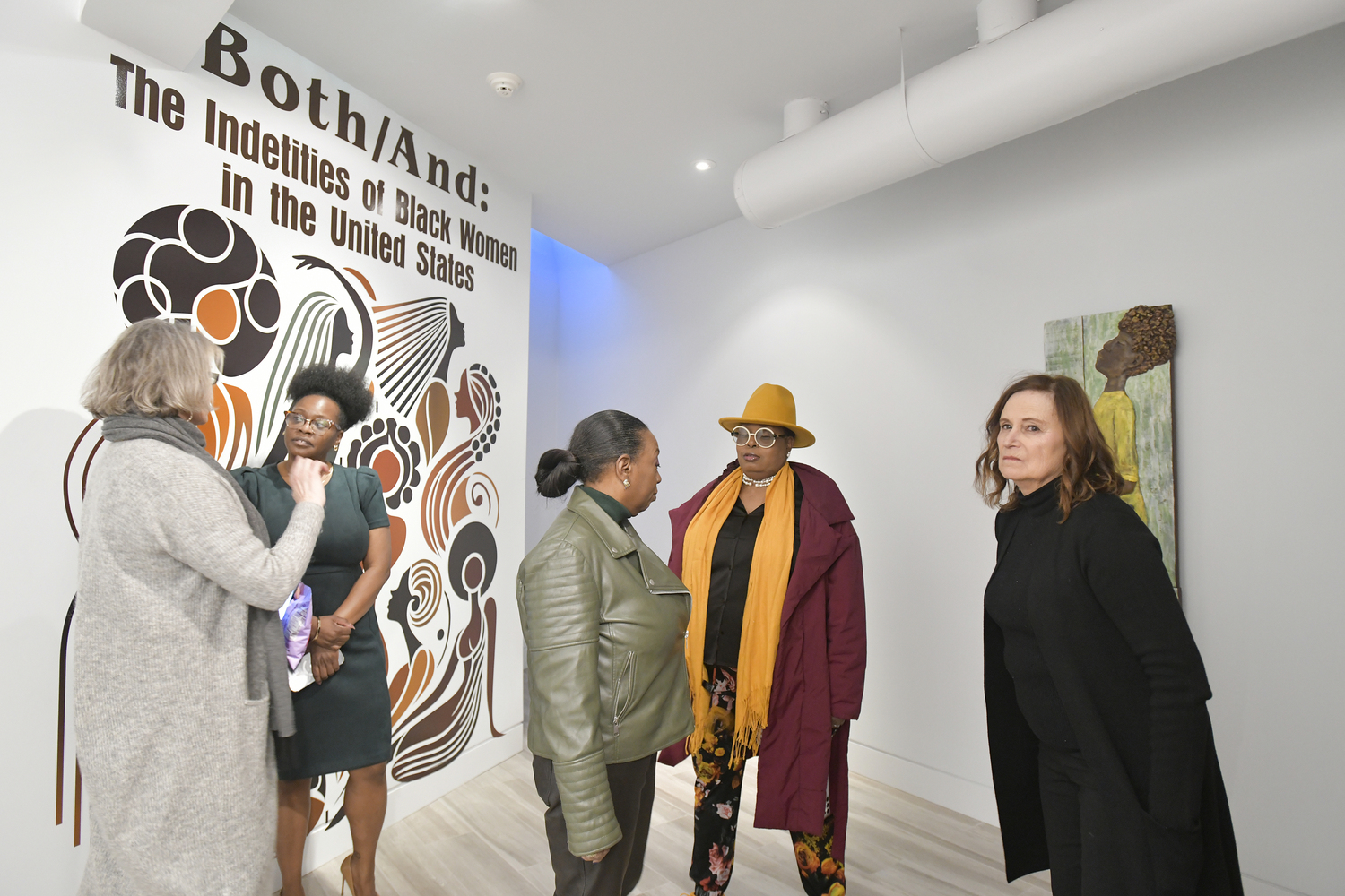 The opening of “Both/And: An Exploration of the Identities of Being Black and a Woman in the United States” on February 26, at the Southampton African American Museum.    DANA SHAW