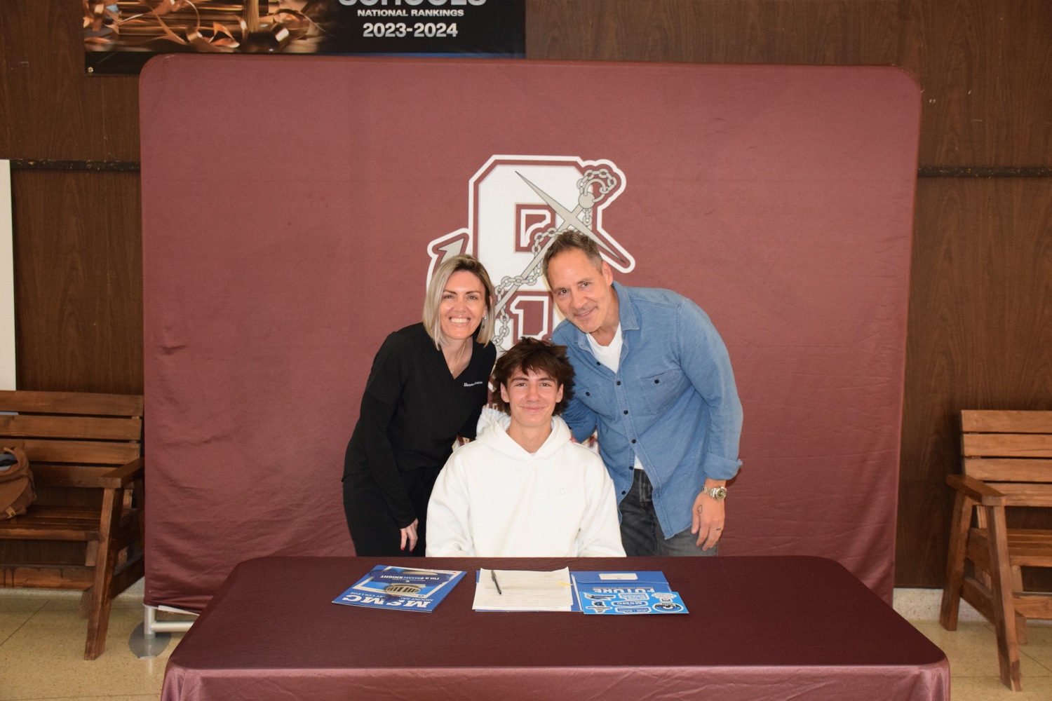 Jett De Sane, flanked by his parents Jamie Carlsen and Joseph De Sane.   COURTESY SOUTHAMPTON SCHOOL DISTRICT