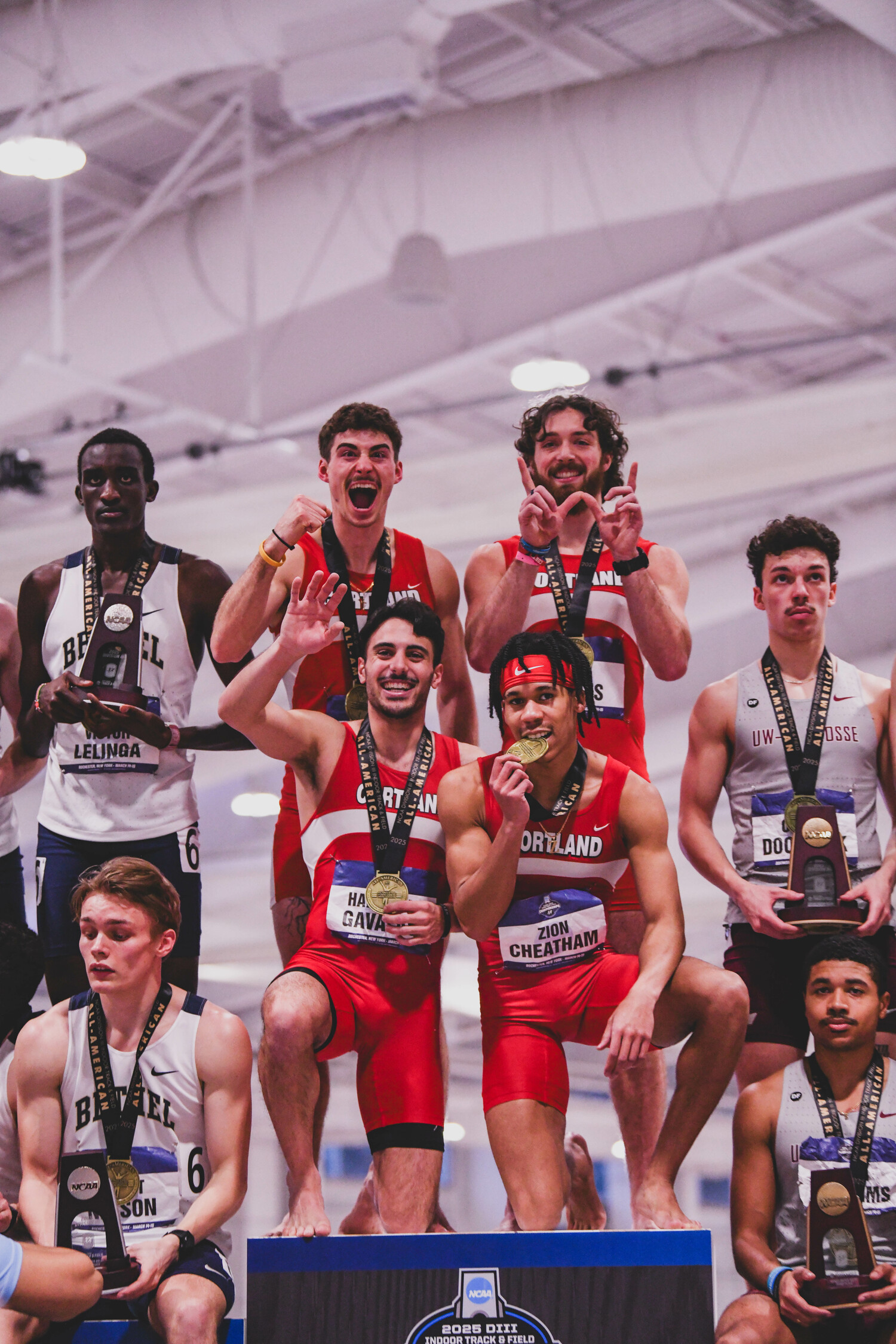 Harrison Gavalas, bottom left, on top of the podium with his Cortland teammates. EDL PHOTOGRAPHY/ERIN LOCASCIO