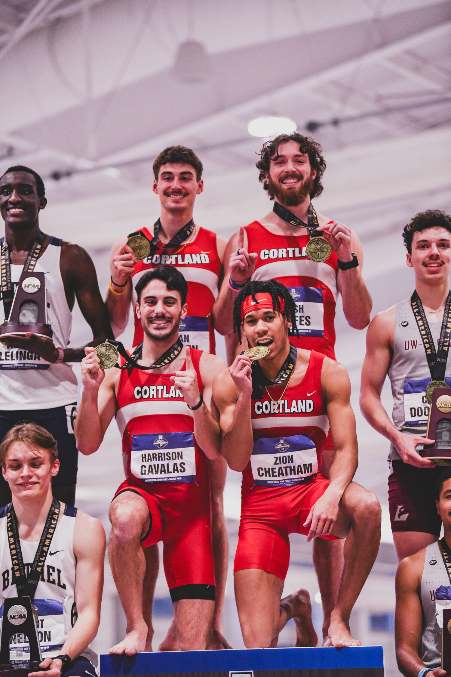 Harrison Gavalas, bottom left, on top of the podium with his Cortland teammates. EDL PHOTOGRAPHY/ERIN LOCASCIO