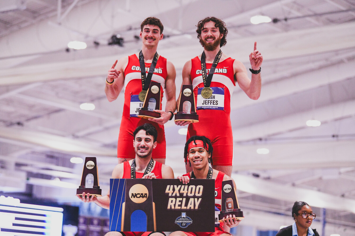 Harrison Gavalas, bottom left, on top of the podium with his Cortland teammates. EDL PHOTOGRAPHY/ERIN LOCASCIO