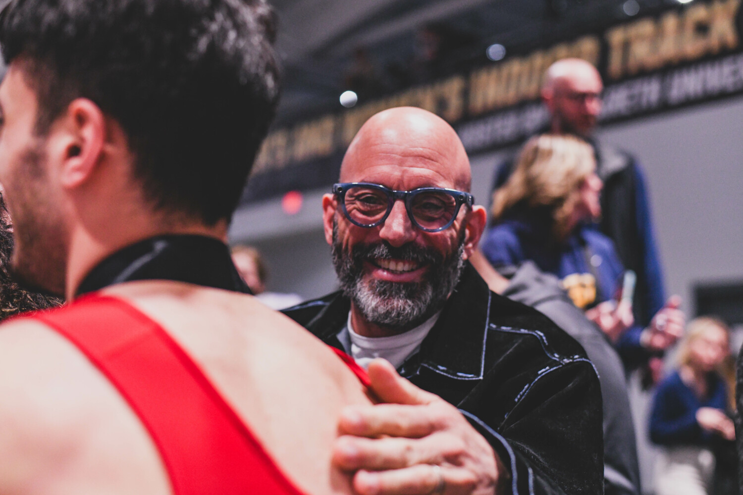 George Gavalas pats his son Harrison on the back.   EDL PHOTOGRAPHY/ERIN LOCASCIO