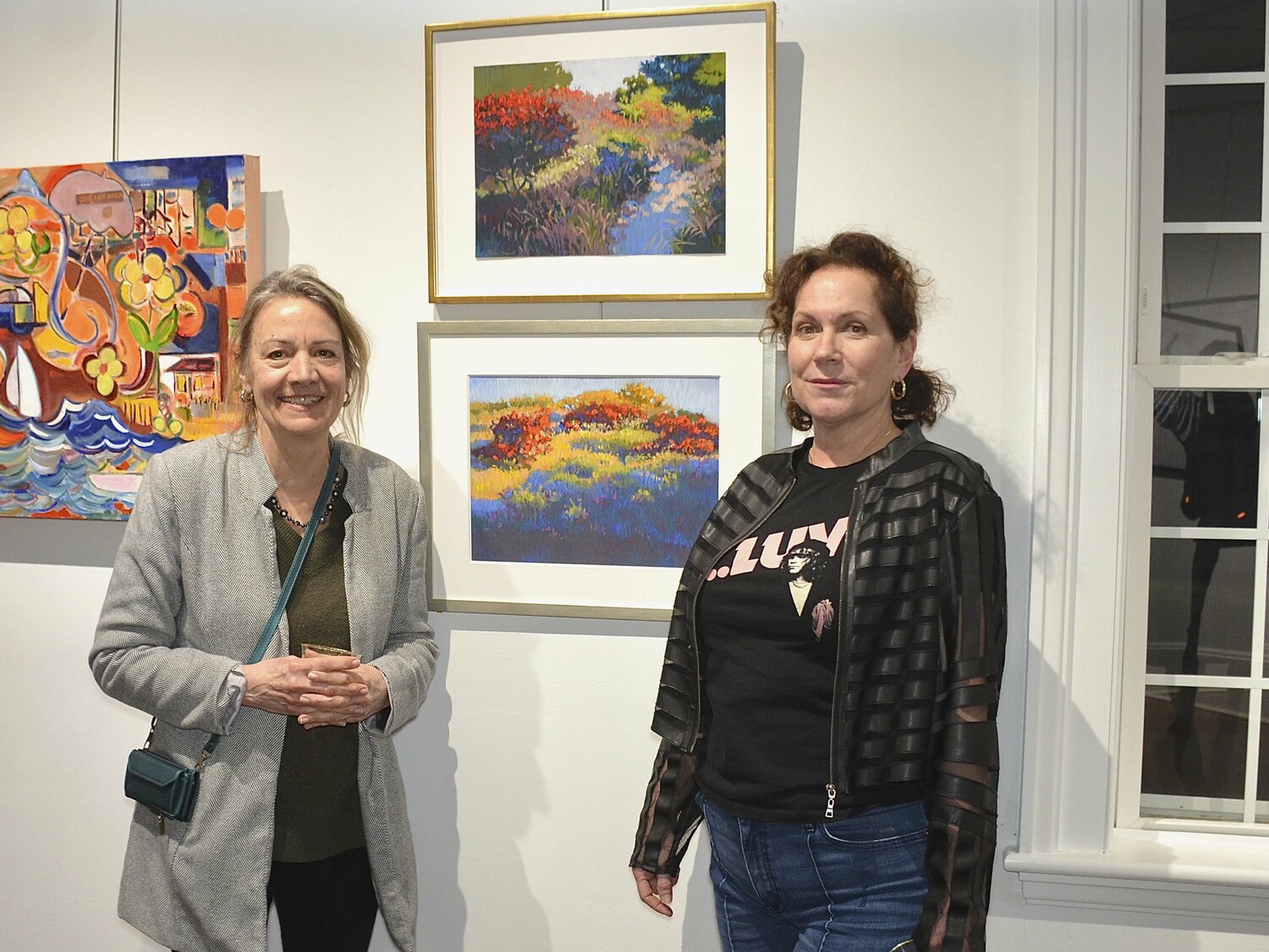 Mary Daunt and Karyn Mannix at the opening of the  the 20th Annual Love & Passion Art Show on Saturday at Ashawagh Hall.  KYRIL BROMLEY