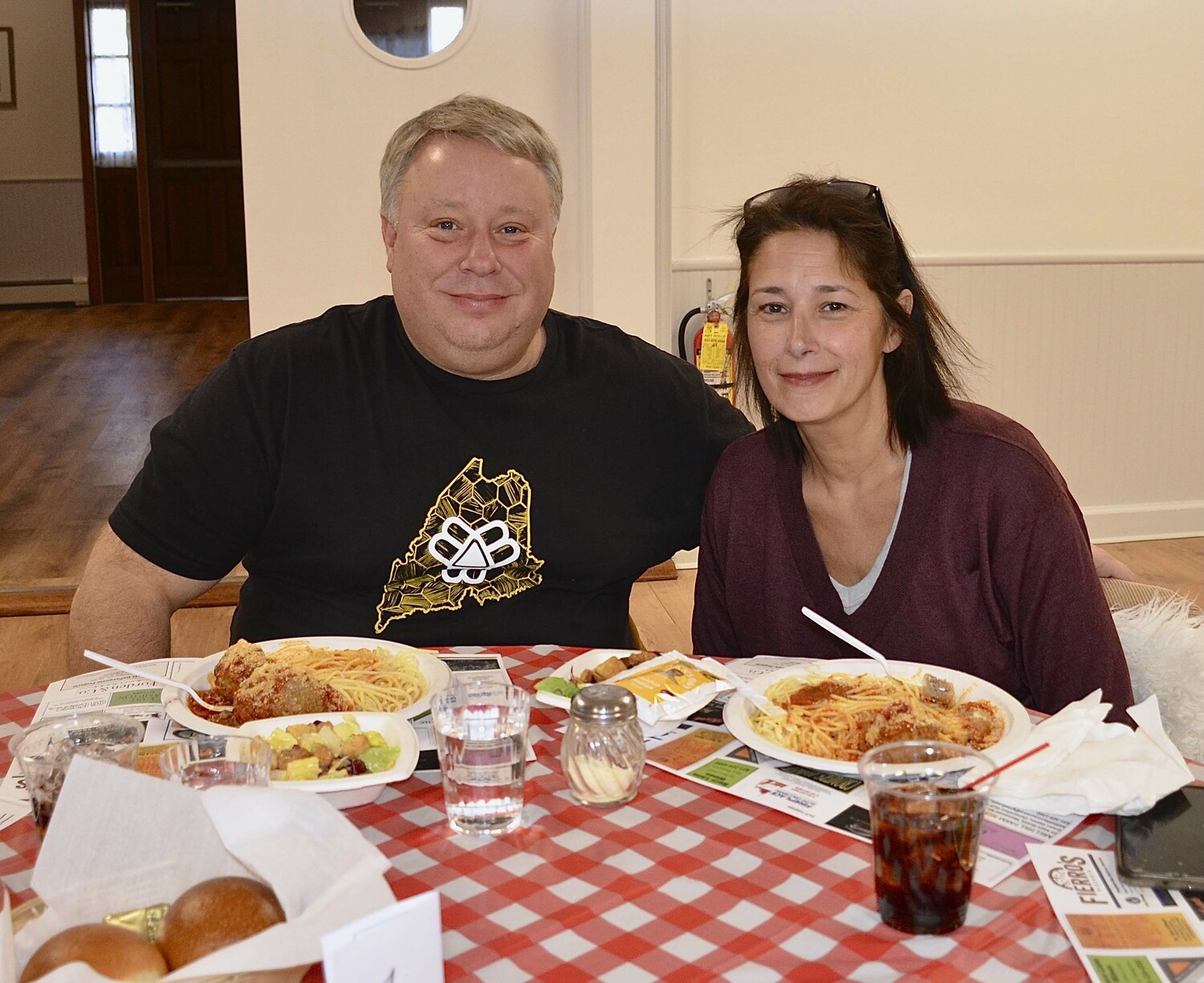 Jon Kilb and Michele Corbett at the East Hampton Rotary Club's spaghetti meatball dinner on Sunday at the American legion Hall in Amagansett.   KYRIL BROMLEY