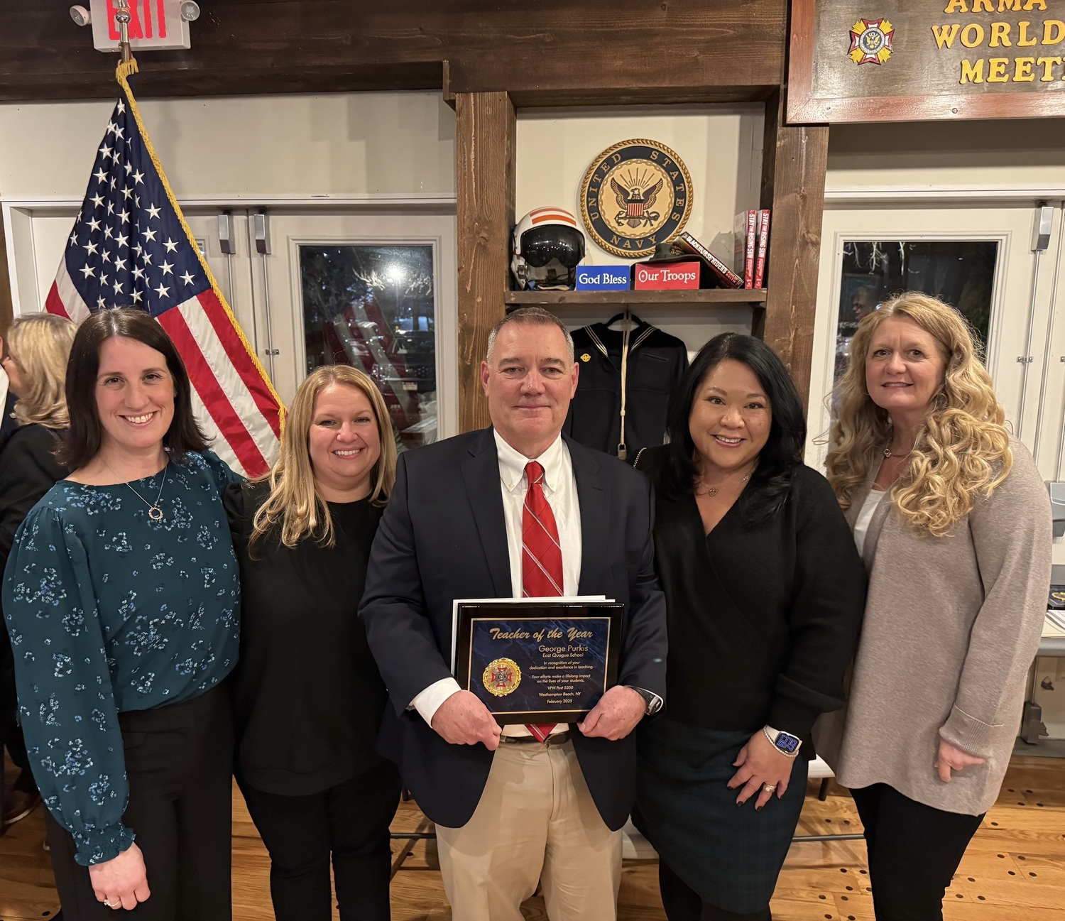 East Quogue School teacher George Purkis was named VFW Post 5350’s Teacher of the Year. From left,  sixth grade teachers Stacey York, Jacqueline Alessi, Purkis, wife Claudia Purkis and sixth grade teacher Patricia Koltzan. COURTESY EAST QUOGUE SCHOOL DISTRICT