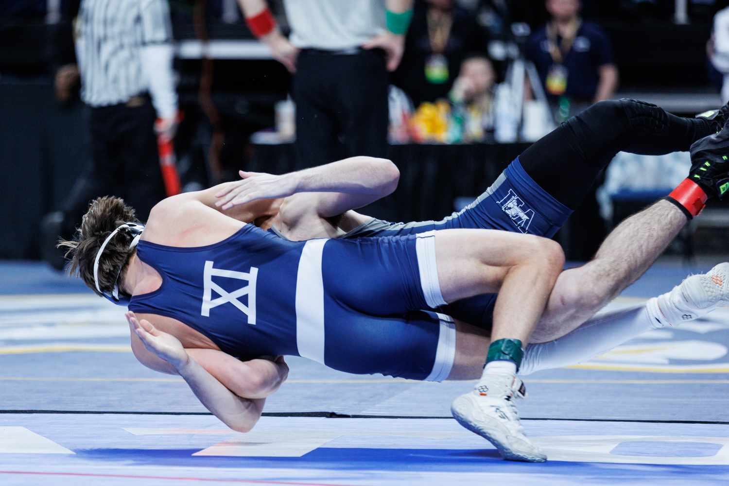 Southampton senior Hudson Fox takes down Saranac junior Landen Gadway to his back.  KEVIN YANG