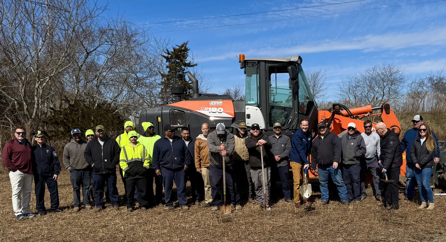 Southampton Village officials, members of the Department of Public Works, and other community members at a groundbreaking ceremony for upgrades at Moses Park, that will include adding bocce courts and a playground. NANCY KANE