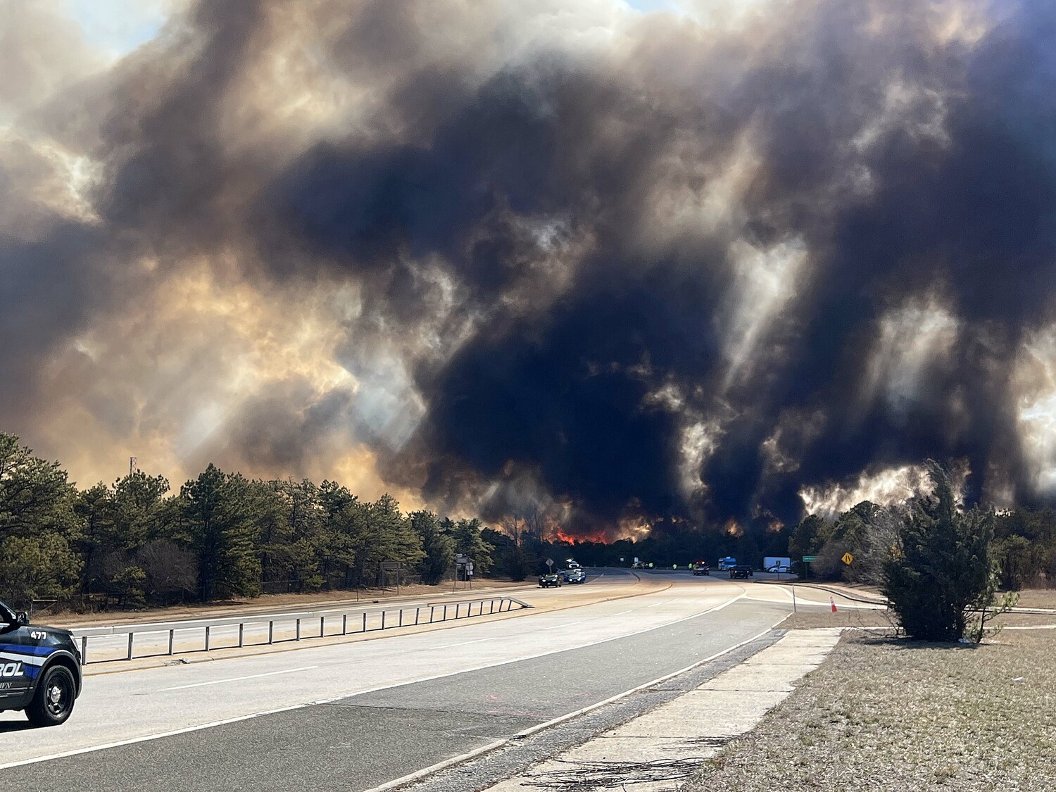 Major wildfires have spread along both sides of Route 27 in western Southampton Town. DANA SHAW