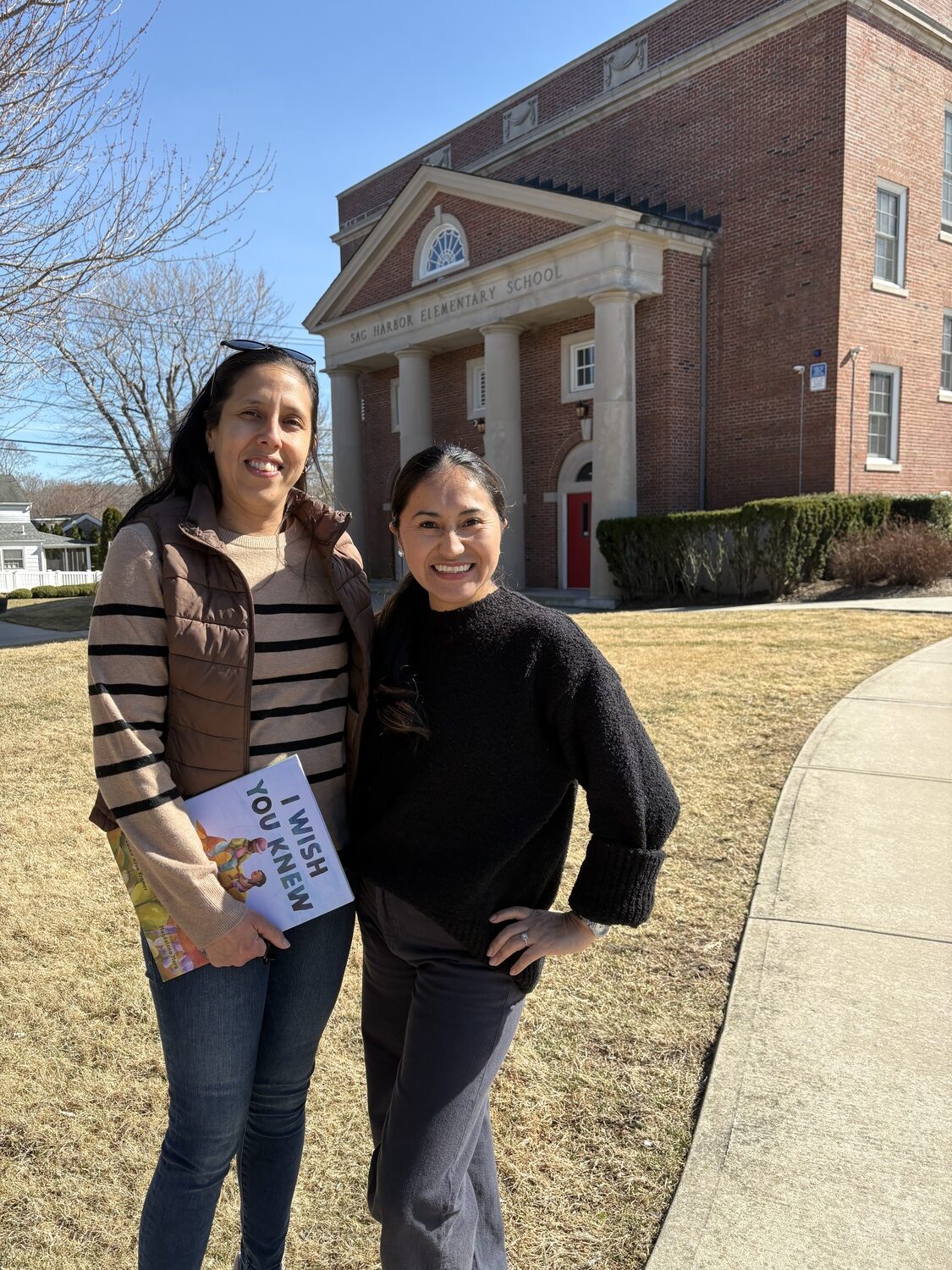 Sag Harbor parents Ana **, left, and Yesenia **. They are two of several parents who spoke at the board meeting on Monday night, requesting better language access in the Sag Harbor School District. CAILIN RILEY