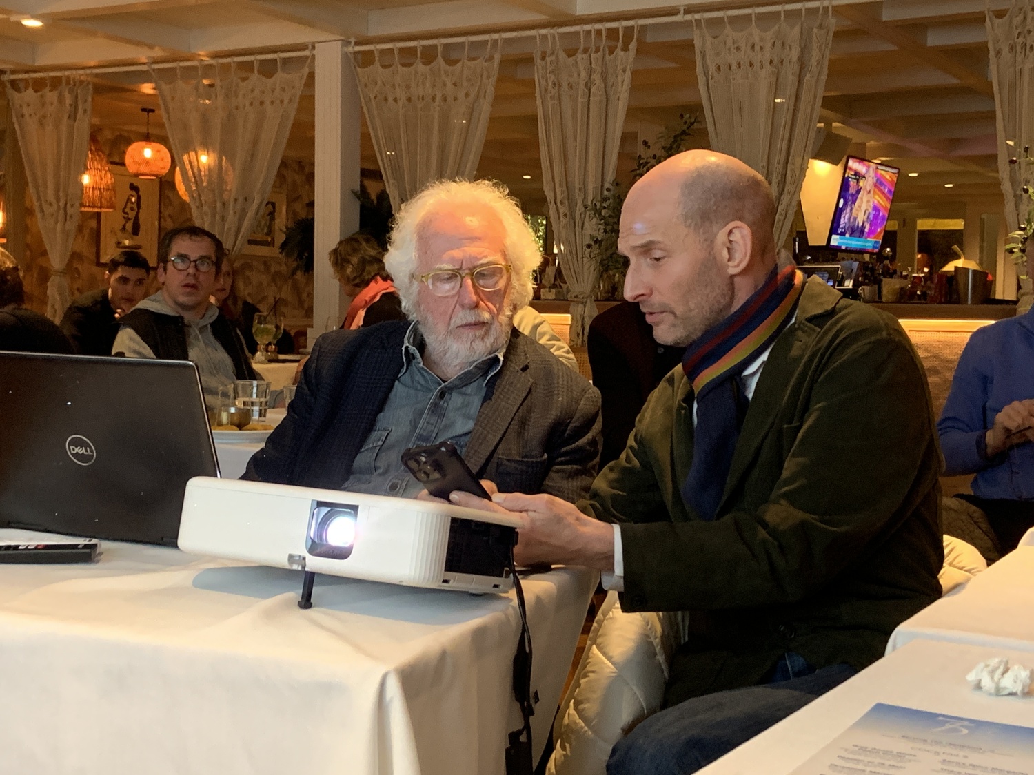 Democratic chairman Gordon Herr, left, and Town Board candidate John Leonard check results on Election Night. STEPHEN J. KOTZ