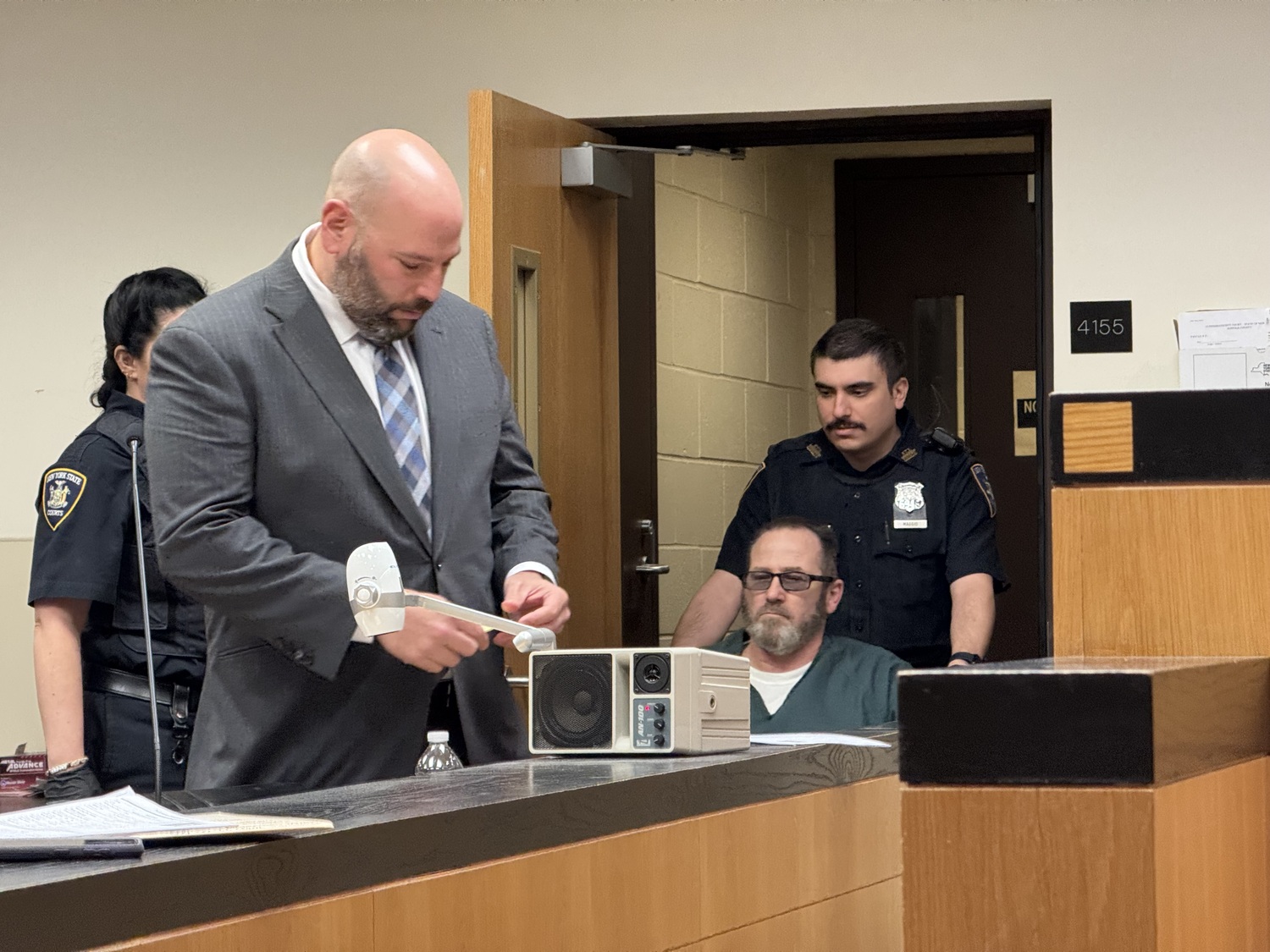 Dominick Parisi, who has been confined to a wheelchair for many of his court appearances, was sentenced March 5 for his role in the brutal 2021 Christmas morning killing of a Southampton man- T. E. McMorrow