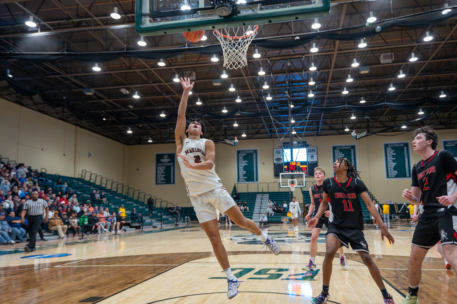 Southampton junior Alex Franklin scores two of his team-high 24 points.   RON ESPOSITO