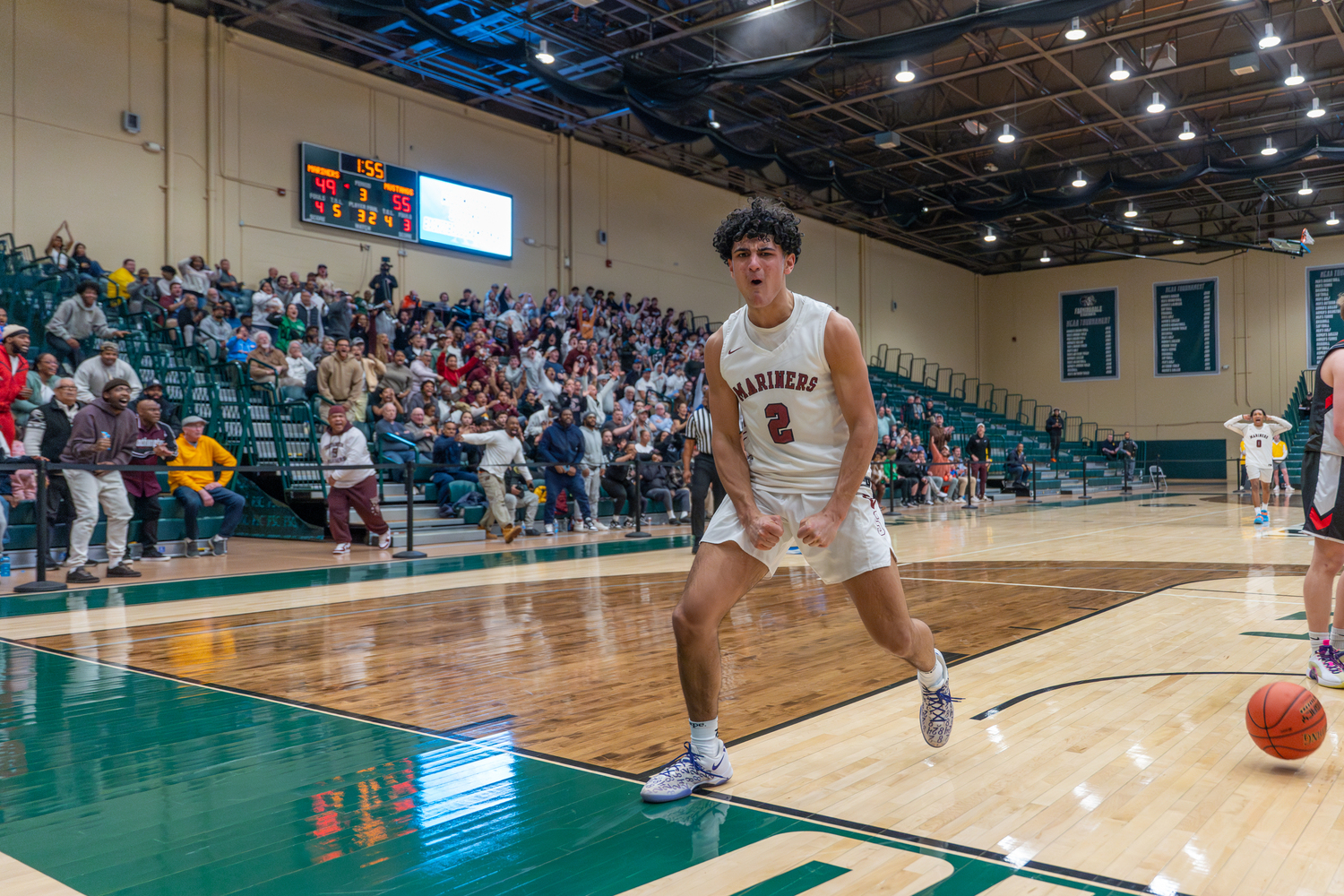 Alex Franklin is pumped up after scoring and heads to the line for a free throw.   RON ESPOSITO