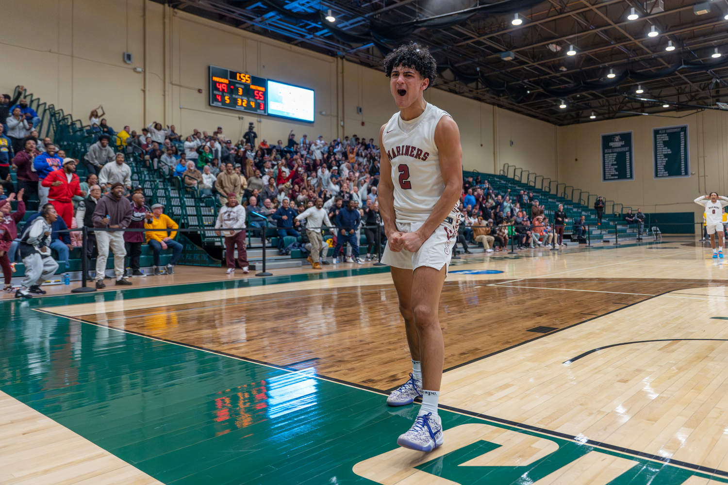 Alex Franklin is pumped up after scoring and heads to the line for a free throw.   RON ESPOSITO