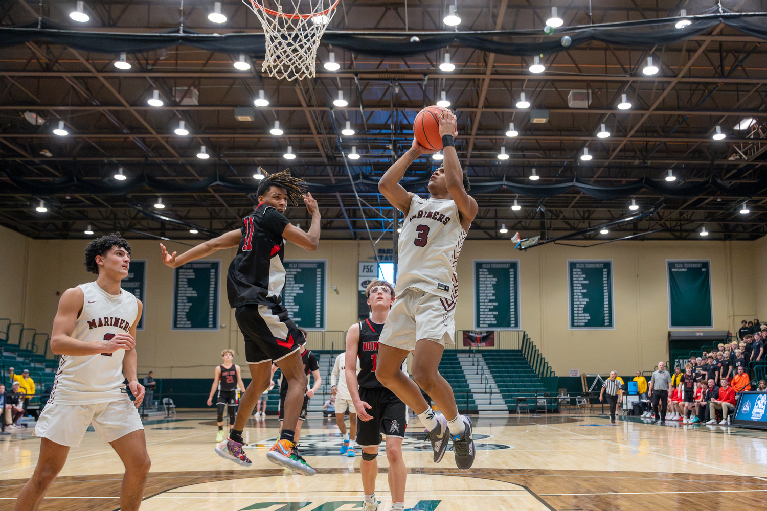 Southampton junior Saevion Ward sneaks by Mount Sinai's Marcus Magloire to score.   RON ESPOSITO