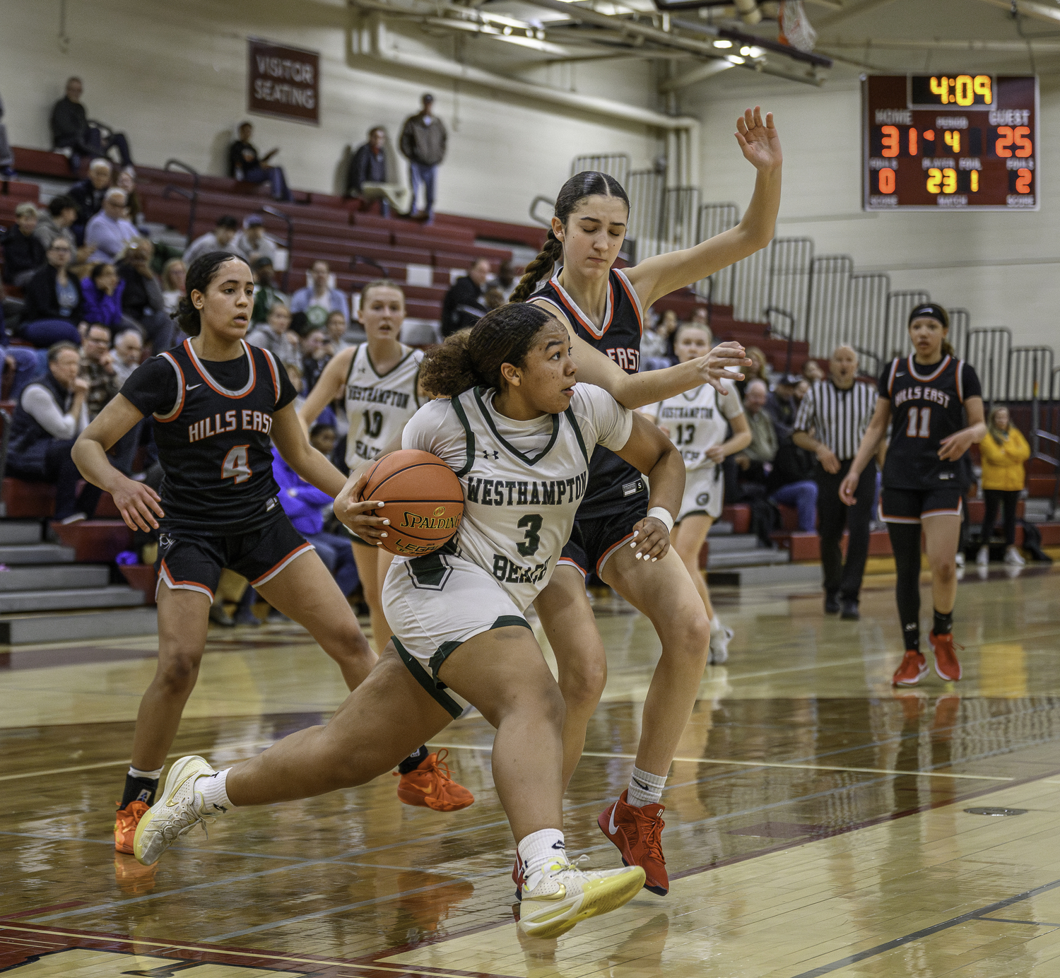 Junior point guard Sandra Clarke drives to the basket. MARIANNE BARNETT