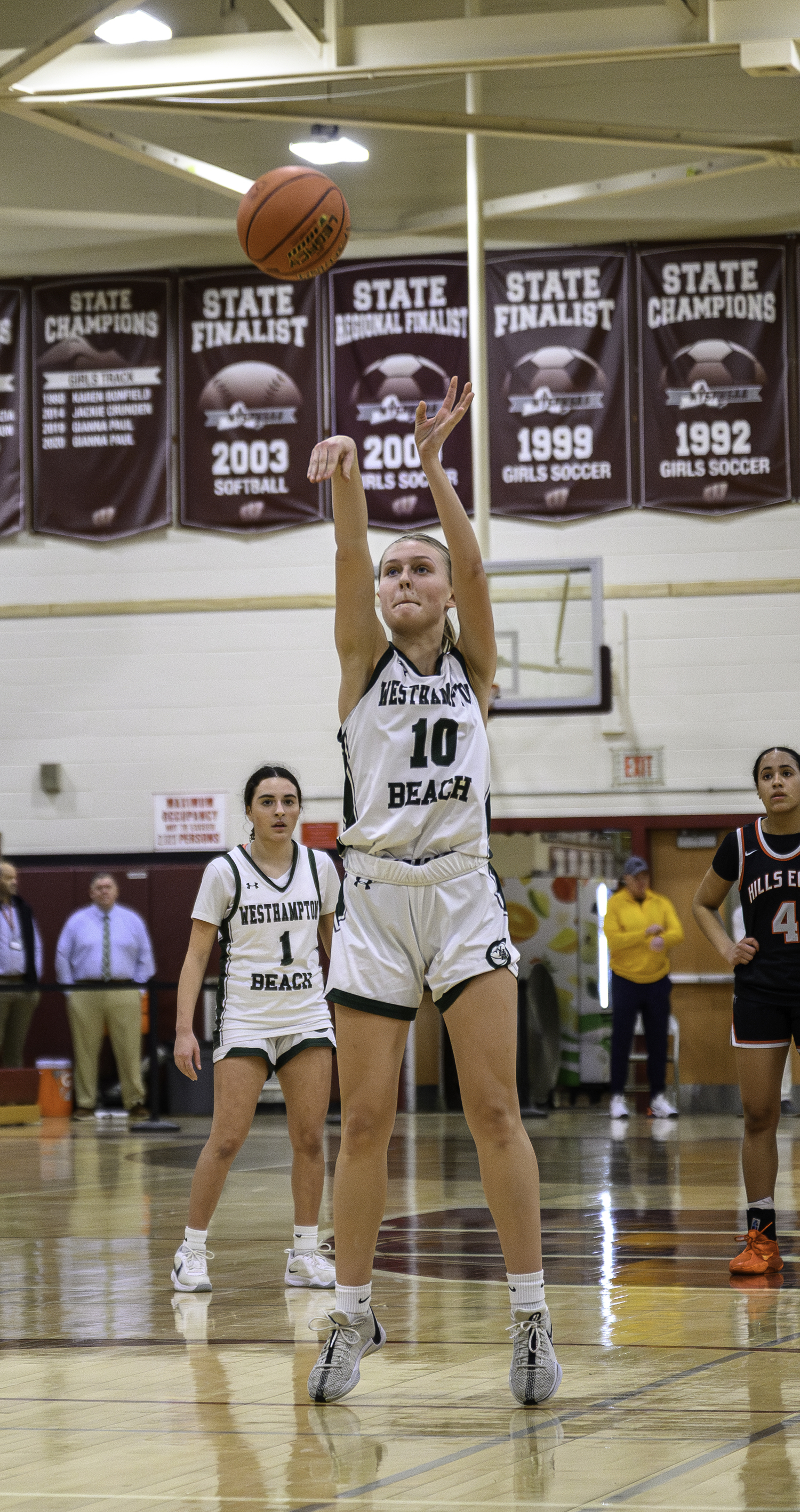 Senior forward Shannon Sweet lets her shot fly. MARIANNE BARNETT