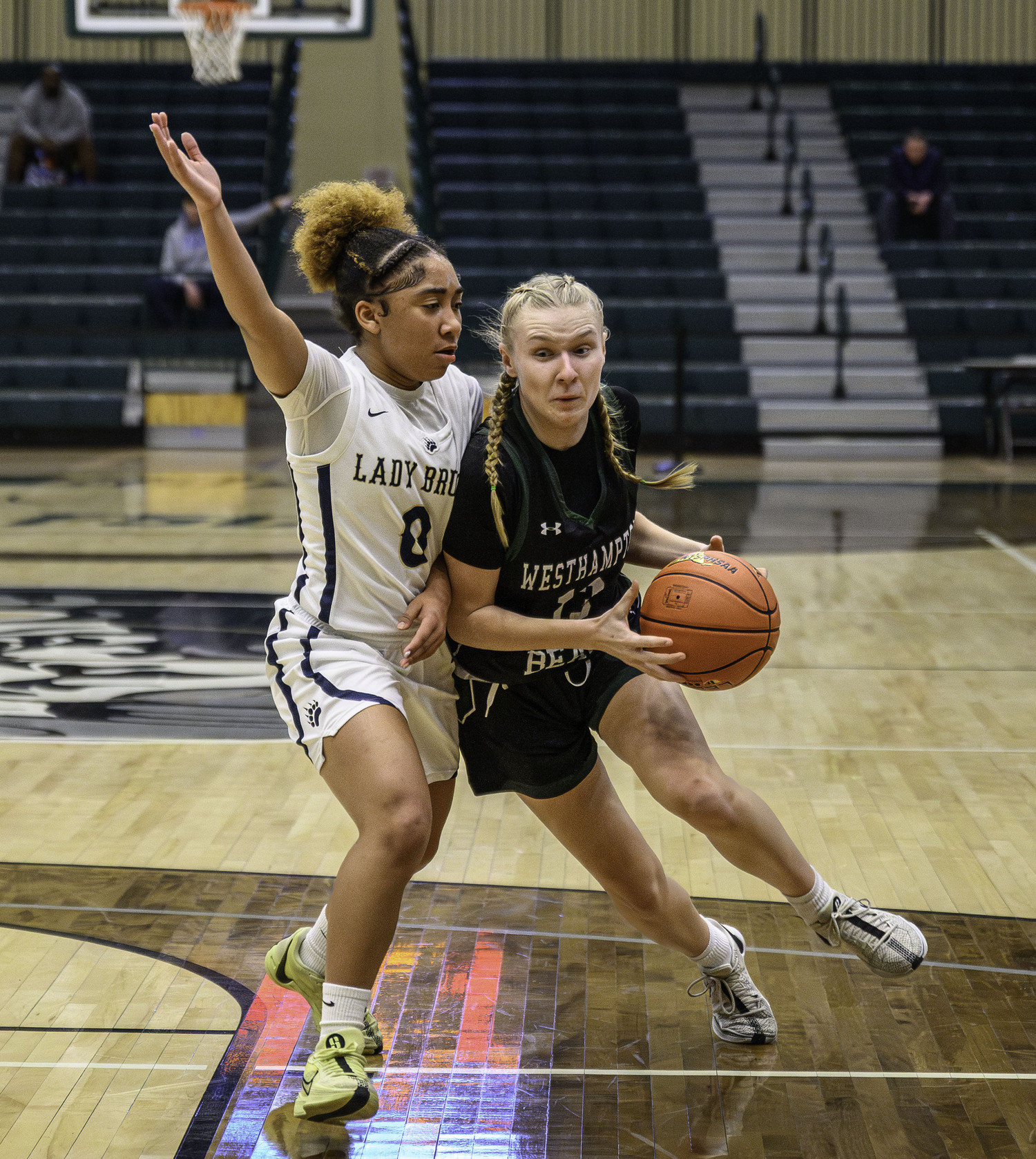 Sophomore guard Kate Sweet drives to the basket. MARIANNE BARNETT