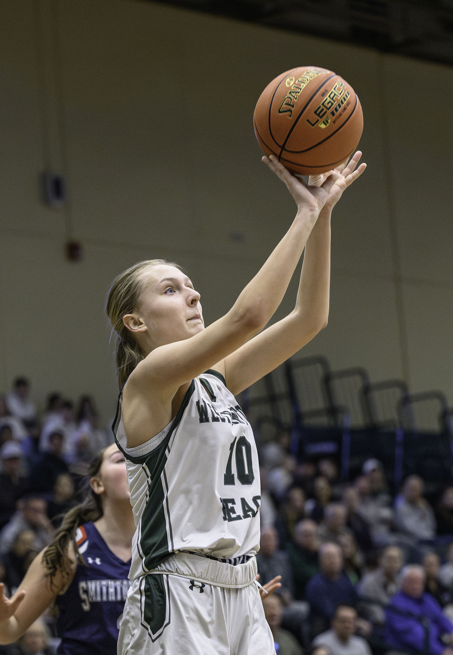 Senior forward Shannon Sweet shoots. MARIANNE BARNETT