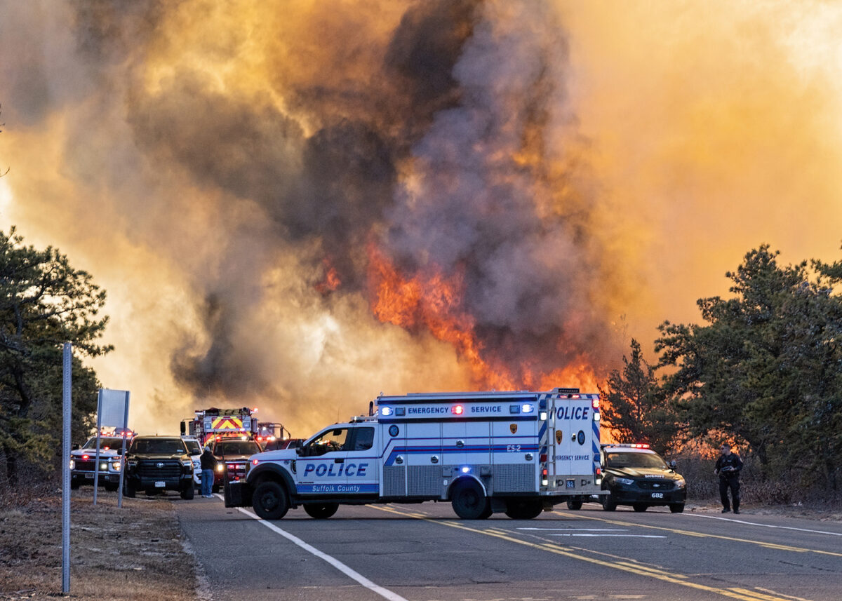 Over 90 fire departments and emergency services  agencies battle a wildfire on Saturday in Westhampton.   COURTESY WESTHAMPTON BEACH FIRE DEPARTMENT