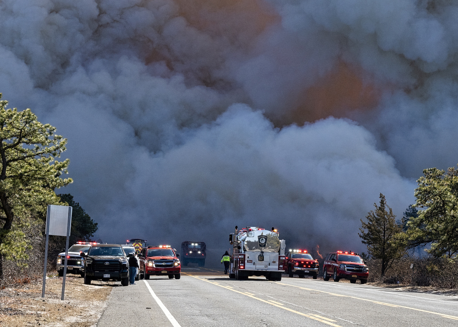 Over 90 fire departments and emergency services  agencies battle a wildfire on Saturday in Westhampton Beach.   COURTESY WESTHAMPTON BEACH FIRE DEPARTMENT