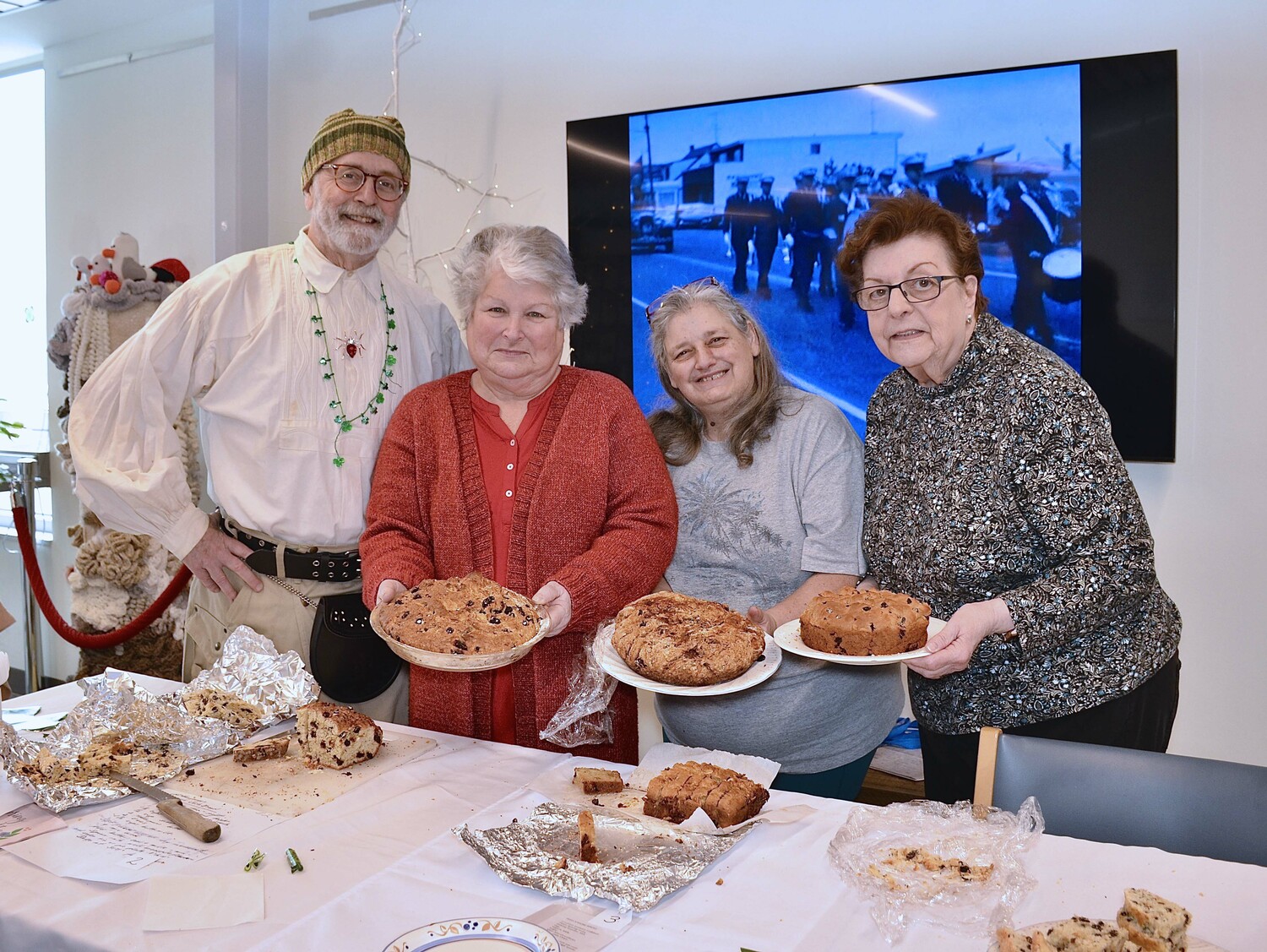 Dan Elliot, Sharon Sennefelder, Lydell Margraf and Marge Harvey at the Irish Soda Bread Bake Off at the Montauk Library on Saturday.  KYRIL BROMLEY