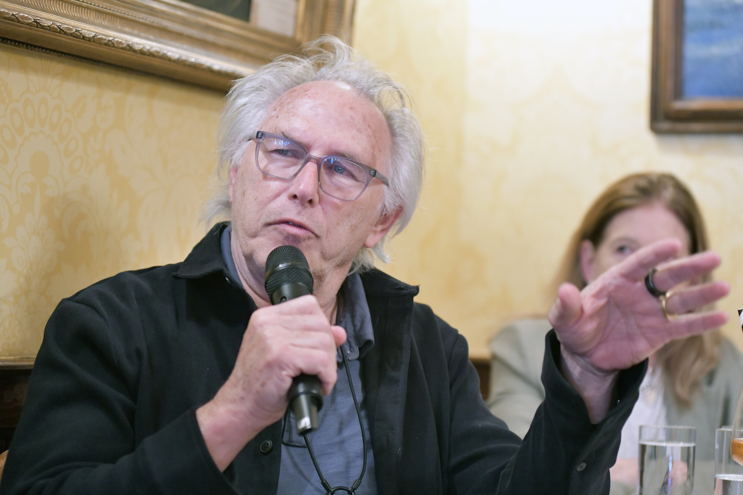 Audience member Eric Fischl makes a point.  DANA SHAW