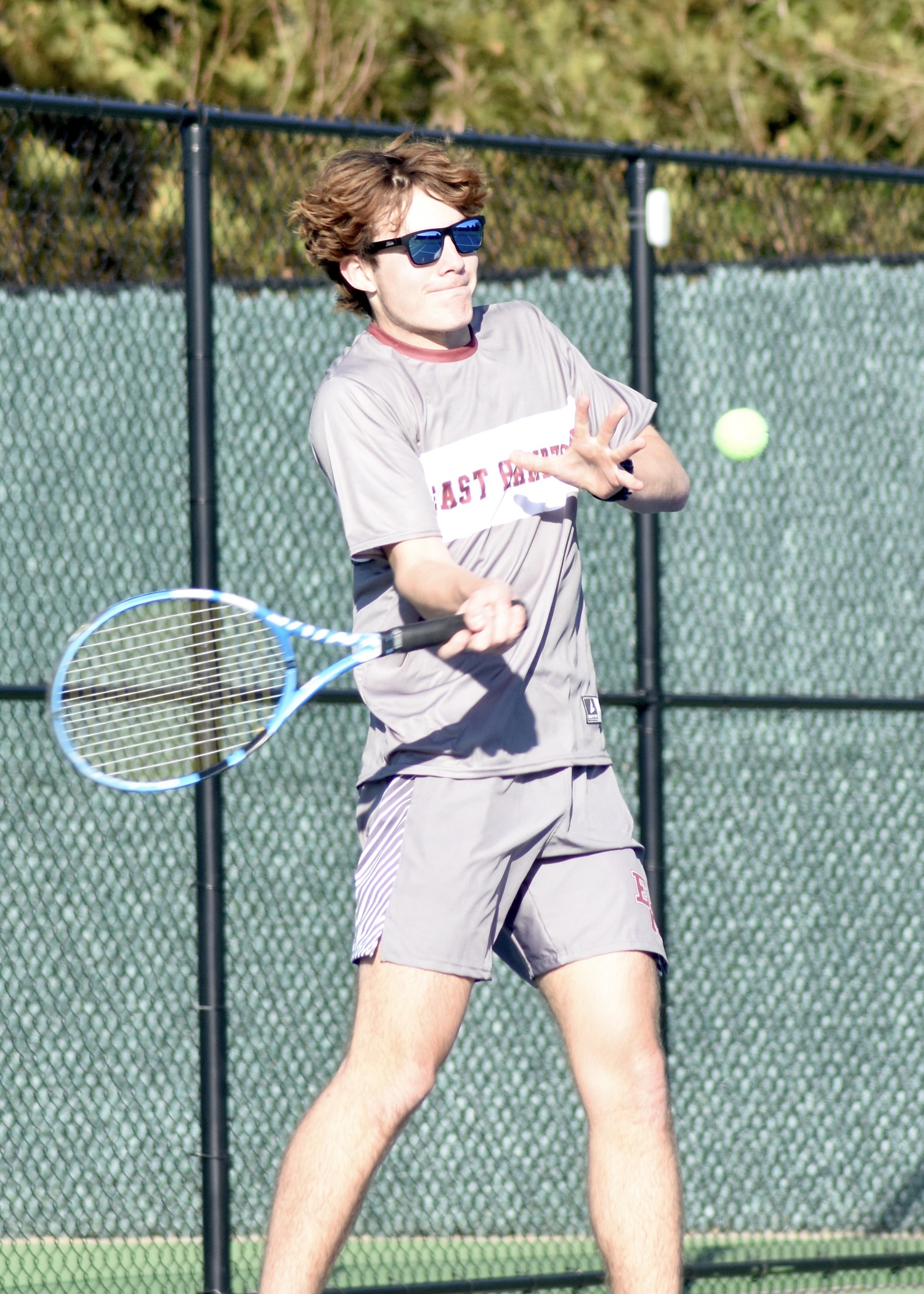 Senior Wyatt Smith connects with the ball. DESIRÉE KEEGAN