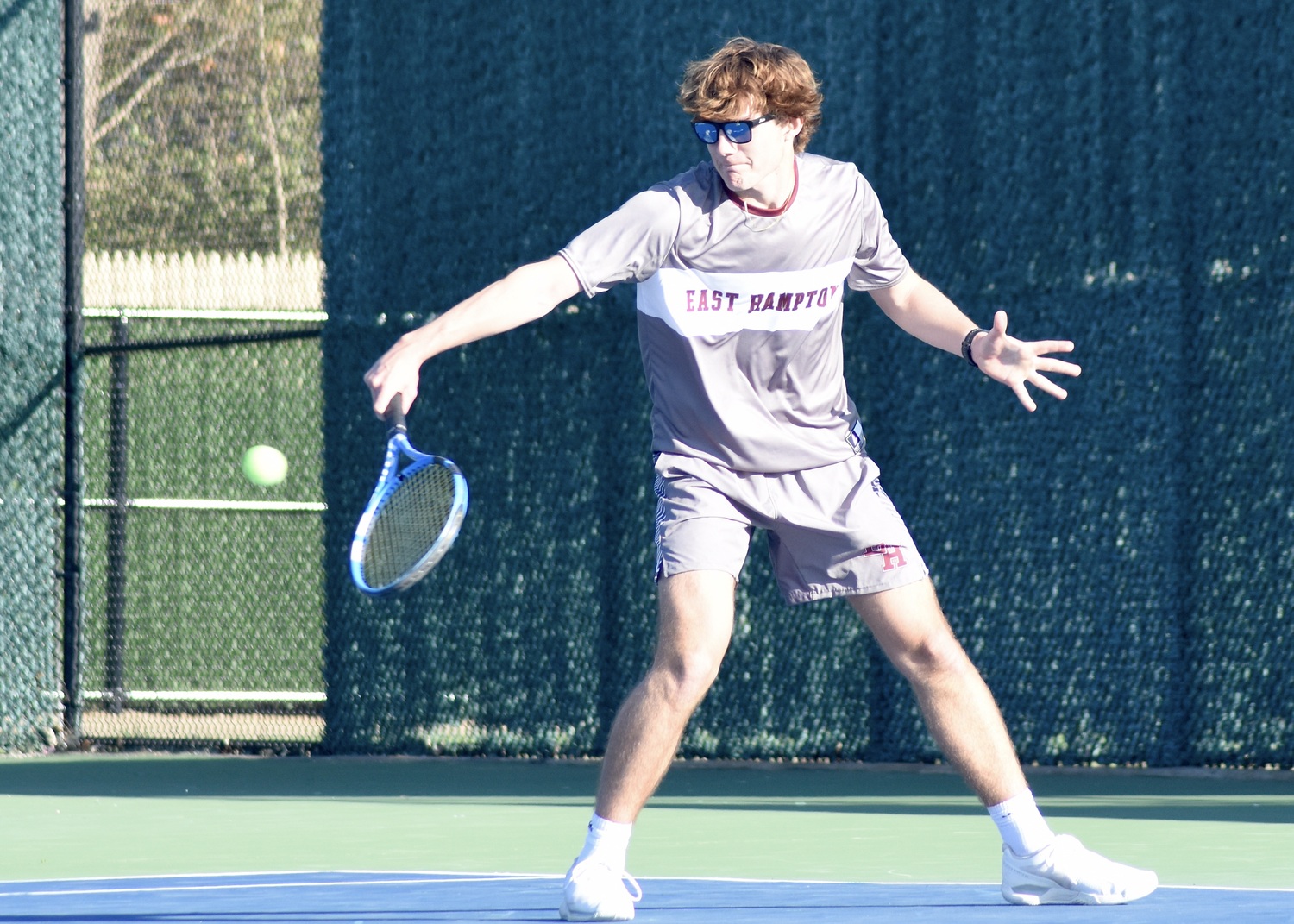 Senior Wyatt Smith backhands the ball. DESIRÉE KEEGAN