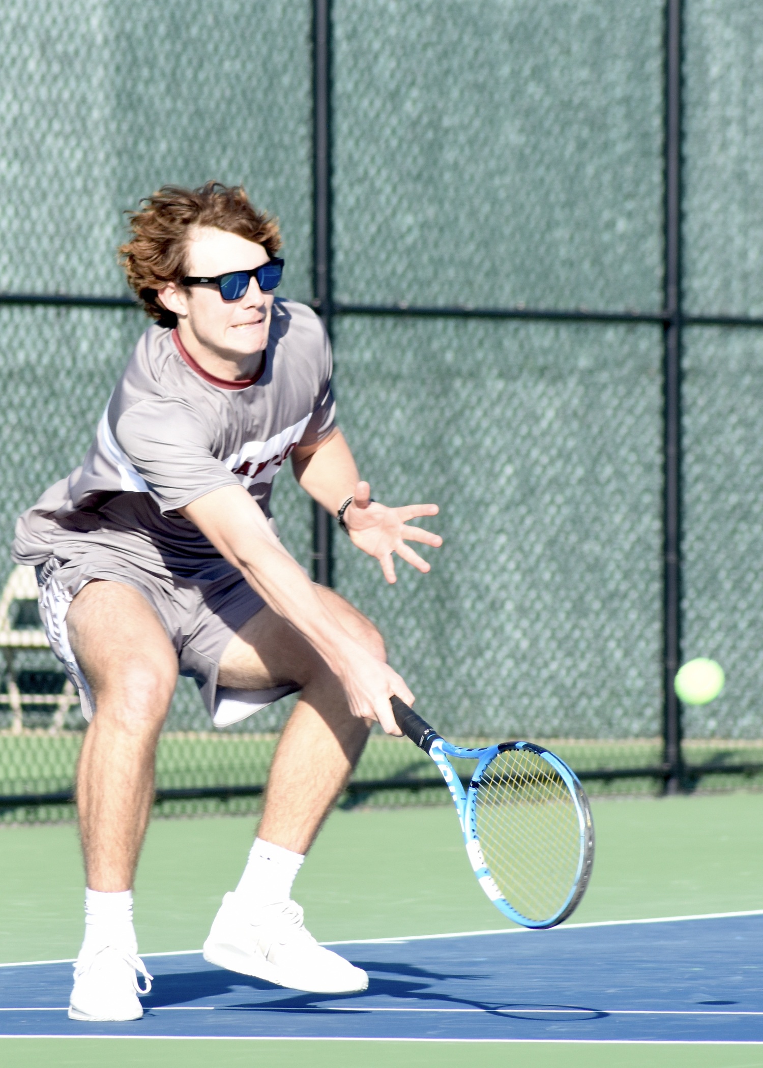 Senior Wyatt Smith rallies. DESIRÉE KEEGAN