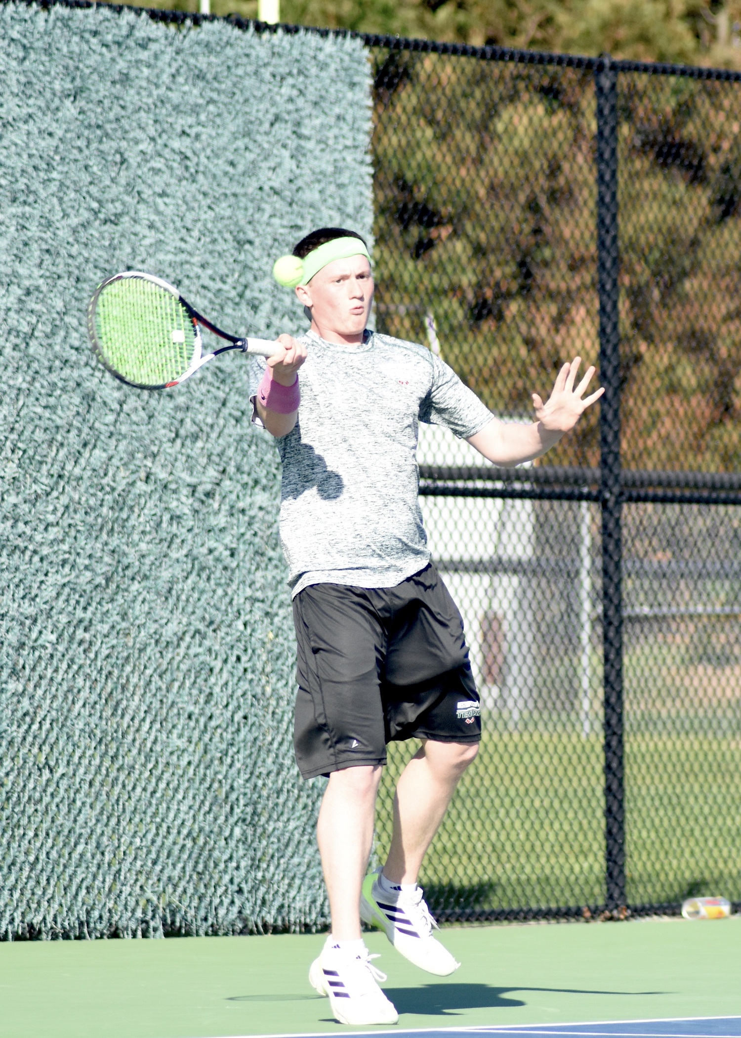 Senior Matt Moran sends the ball back over the net. DESIRÉE KEEGAN