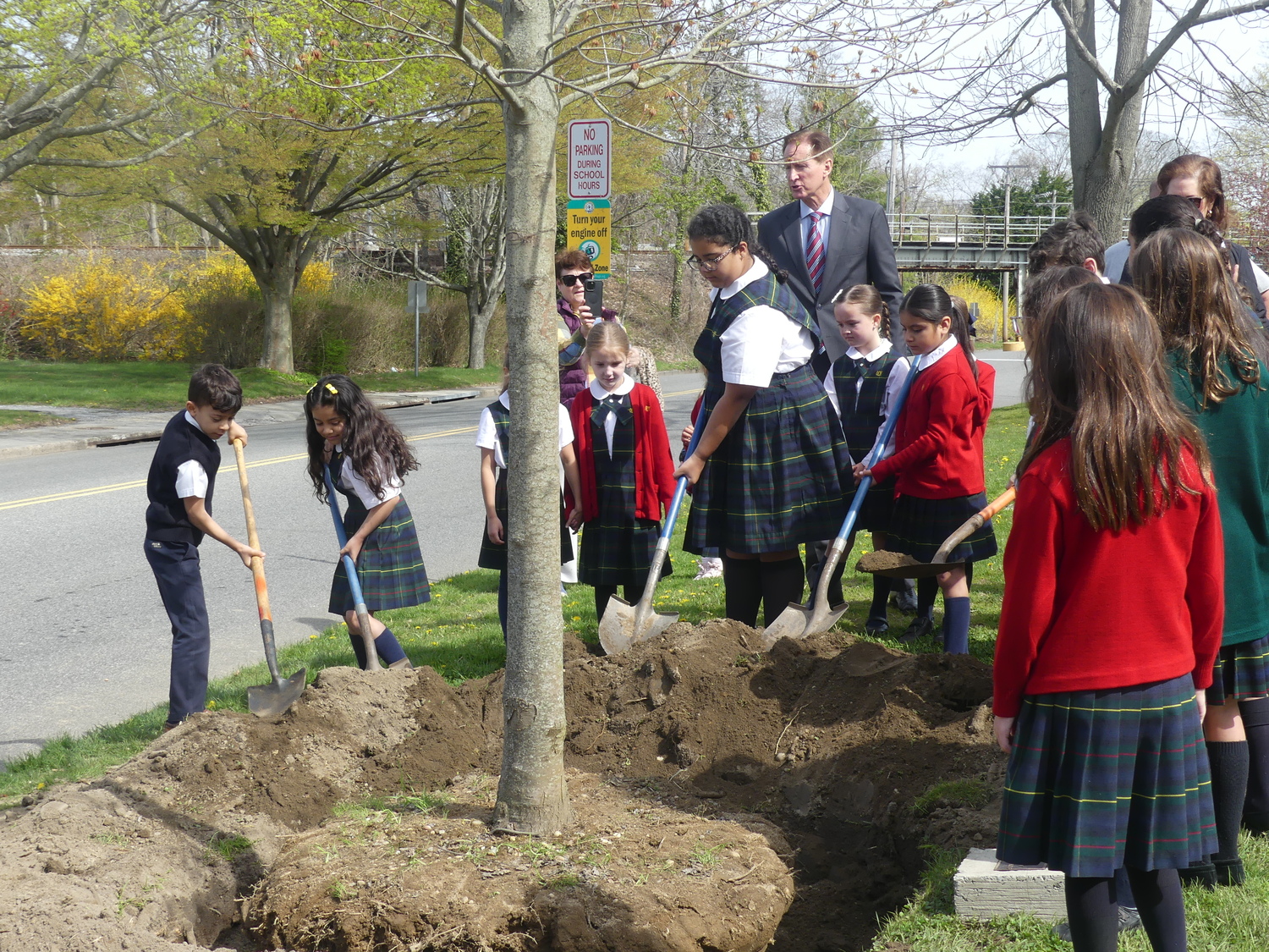 Our Lady of the Hamptons School celebrated Arbor Day by planting a large maple tree in front of the school. Southampton Village Mayor Bill Manger was on hand for the occasion. COURTESY OUR LADY OF THE HAMPTONS SCHOOL