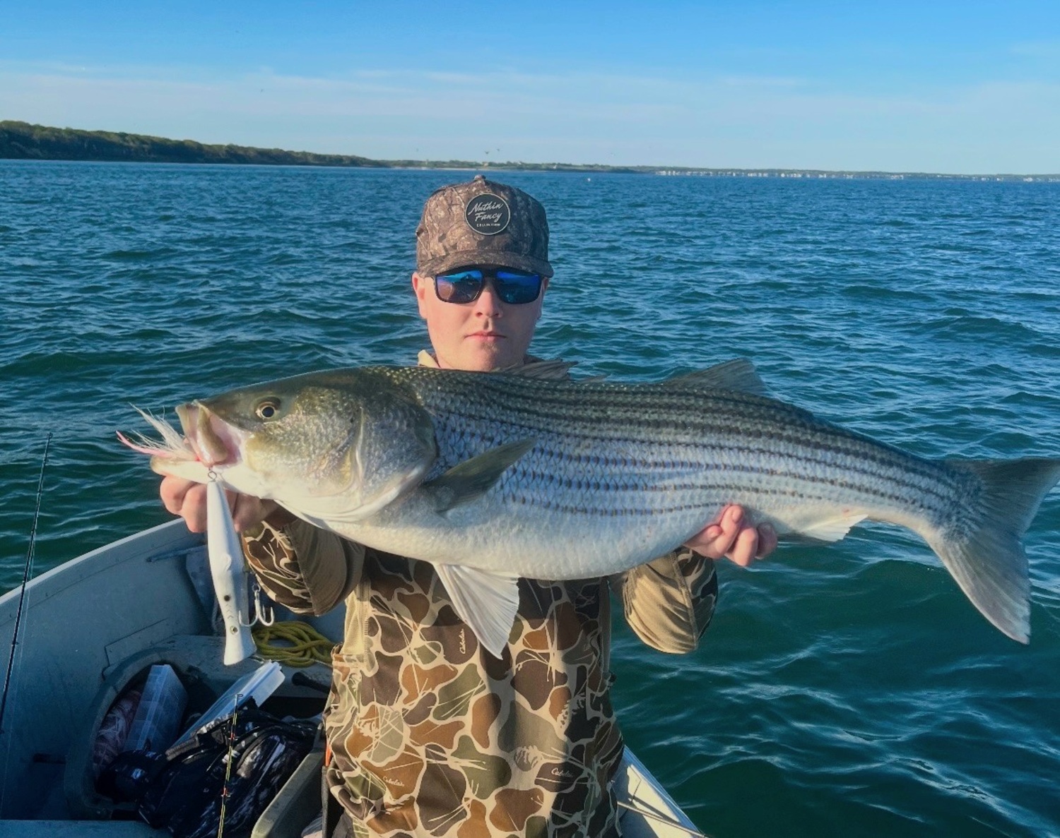 Jack McDonnell of Old Town Custom Tackle has been using his poppers to deck some nice stripers in the Peconics this month. DAN MCDONNELL