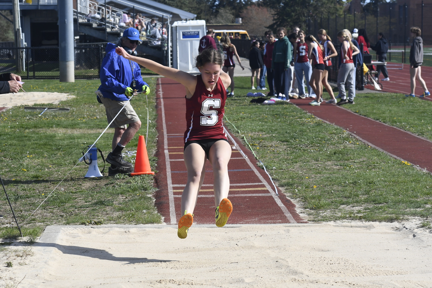 A Southampton student-athlete competes in the triple jump.  DREW BUDD
