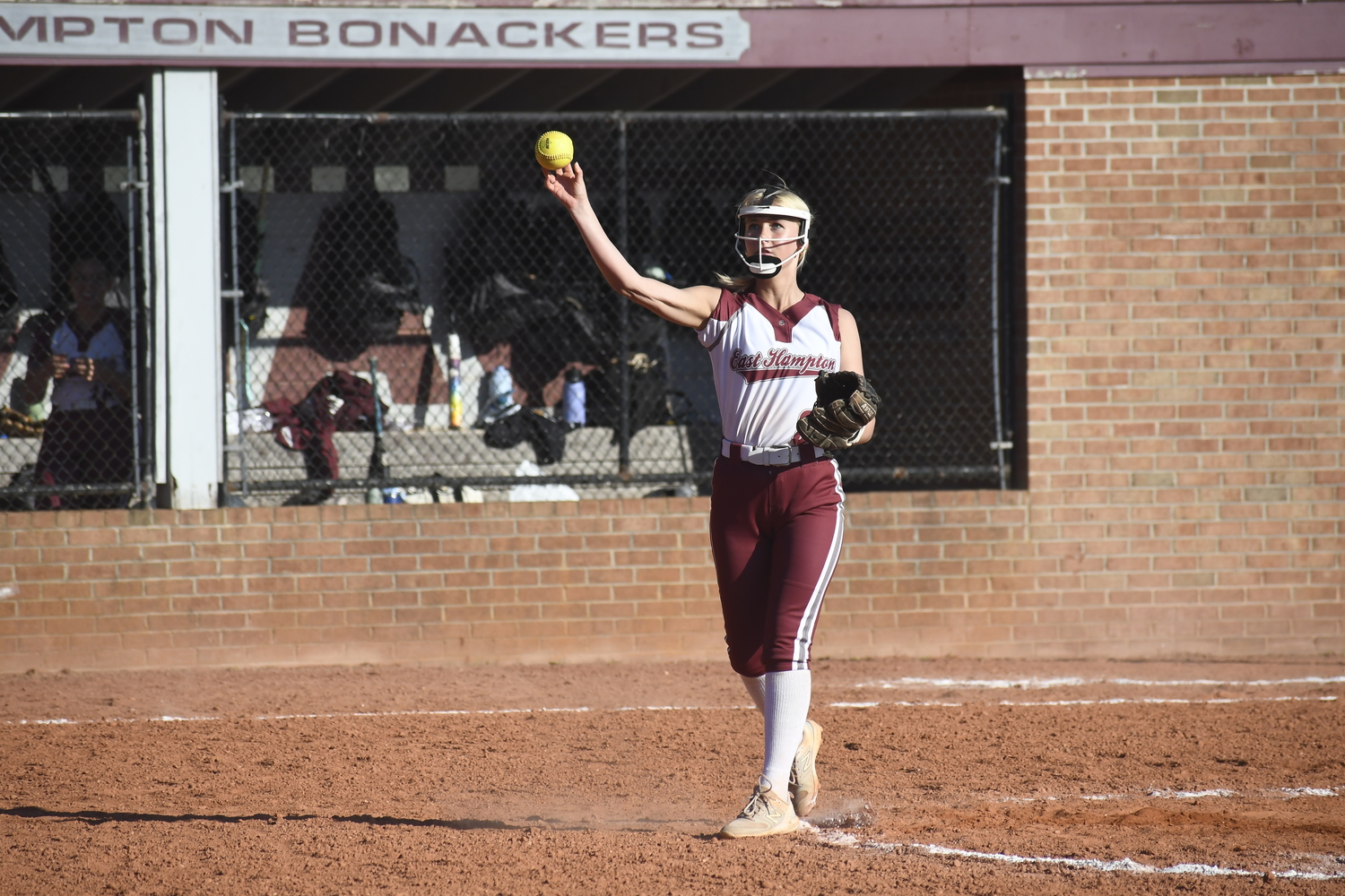 Ella Abran throws to first base for an out.  DREW BUDD