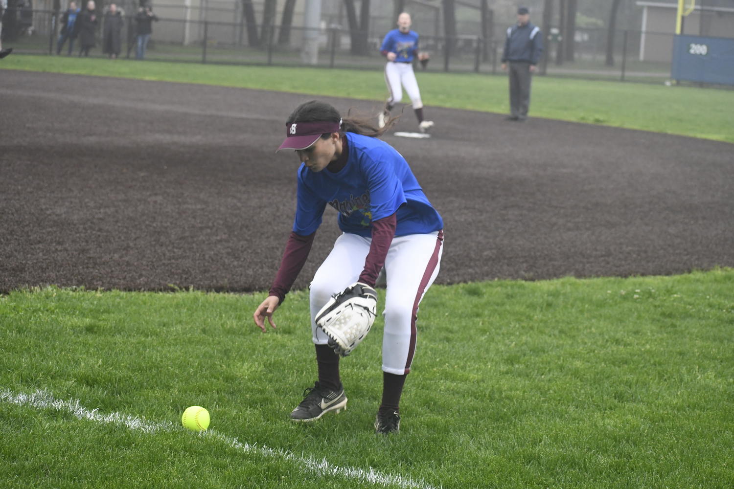 Southampton second baseman Annabella Arnold gets to a ball that just fell a foot and a half or so fair.  DREW BUDD