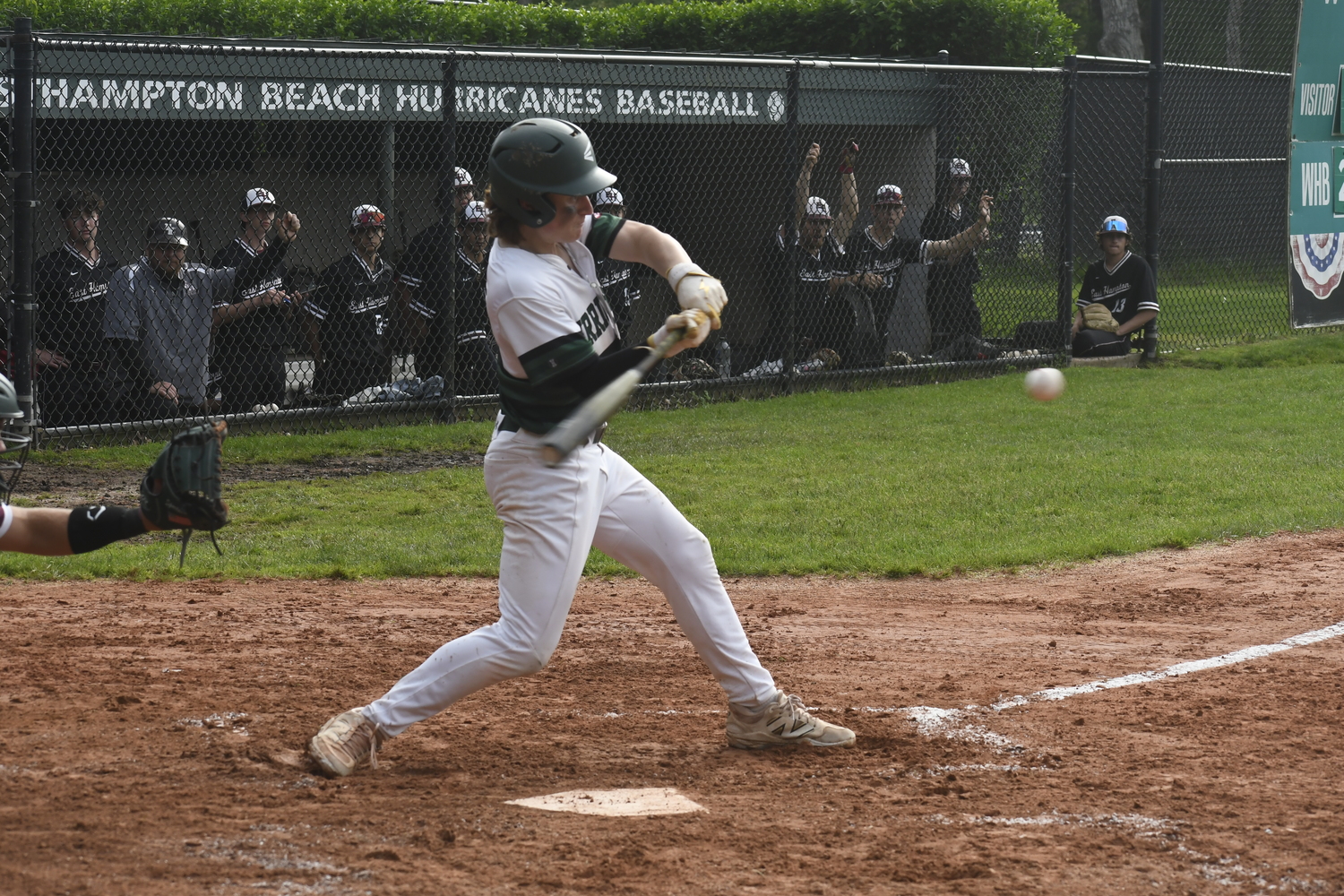 Luke Hefter lines up an incoming pitch.   DREW BUDD