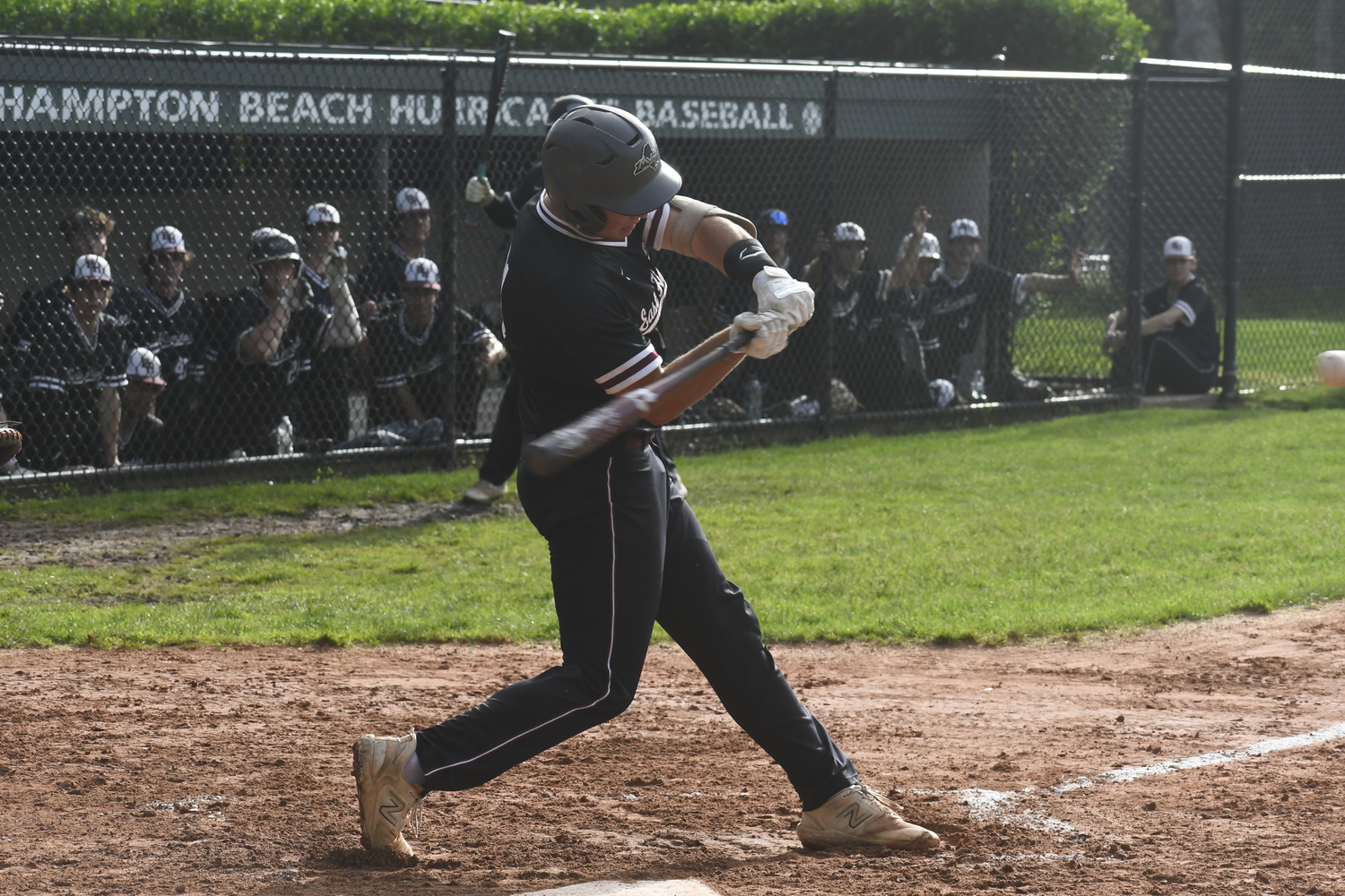 East Hampton Carter Dickinson sent this pitch over the fence in left center field for his first home run of the season.   DREW BUDD