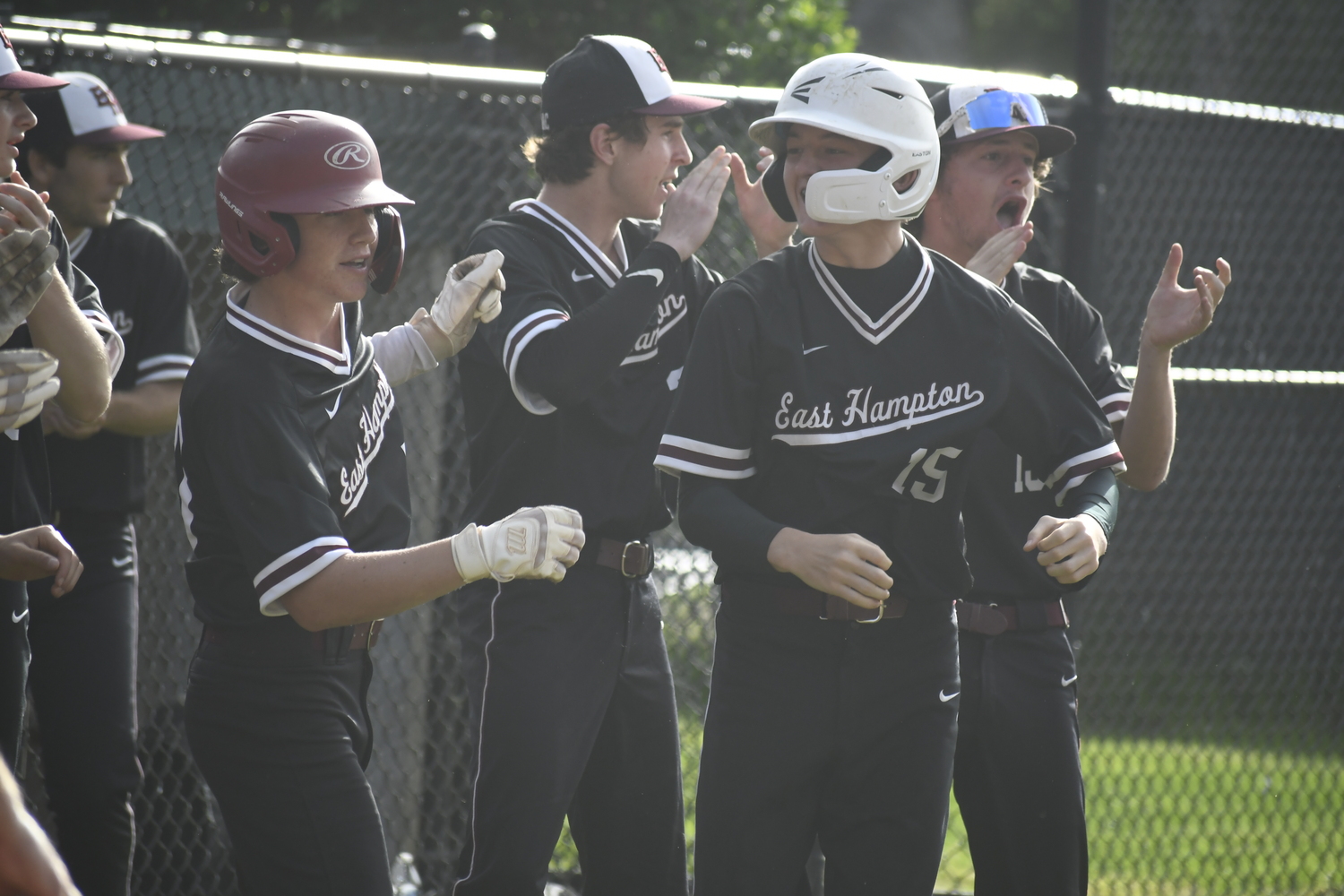 The Bonackers are pumped up after Carter Dickinson's home run.  DREW BUDD
