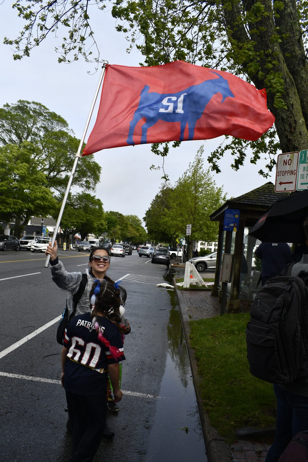 Fans adorn Patriots and Tom Brady gear.  DREW BUDD