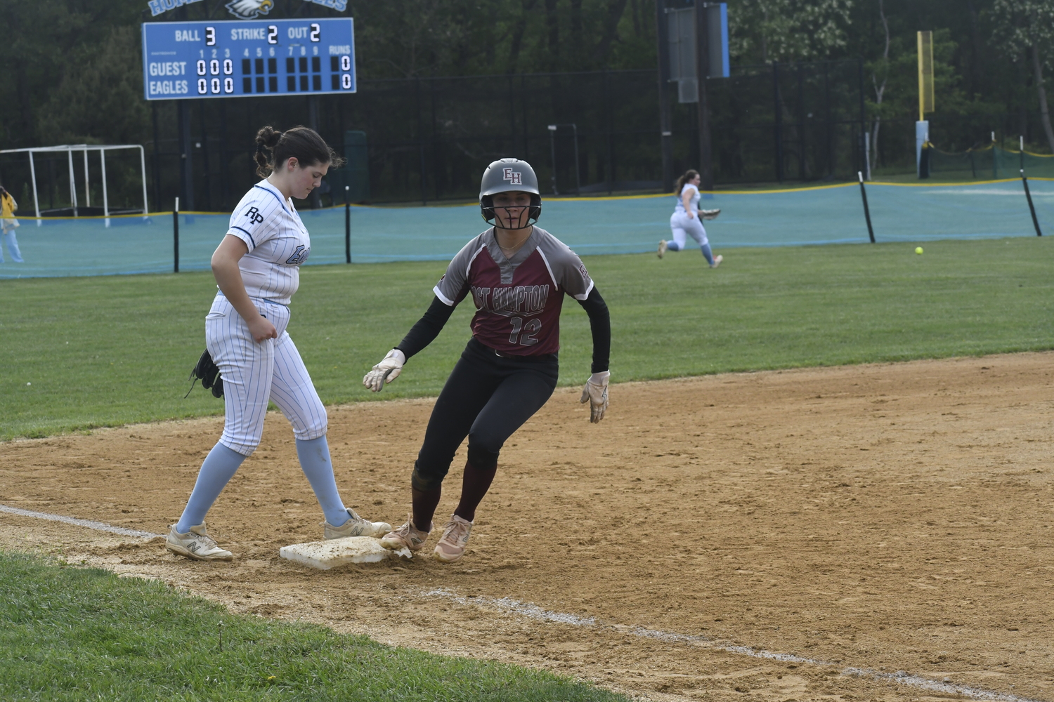Alexa Schaffer rounds third base and heads home to score the game's first run in the top of the fourth inning thanks to a Susie DiSunno double to left  center field.   DREW BUDD