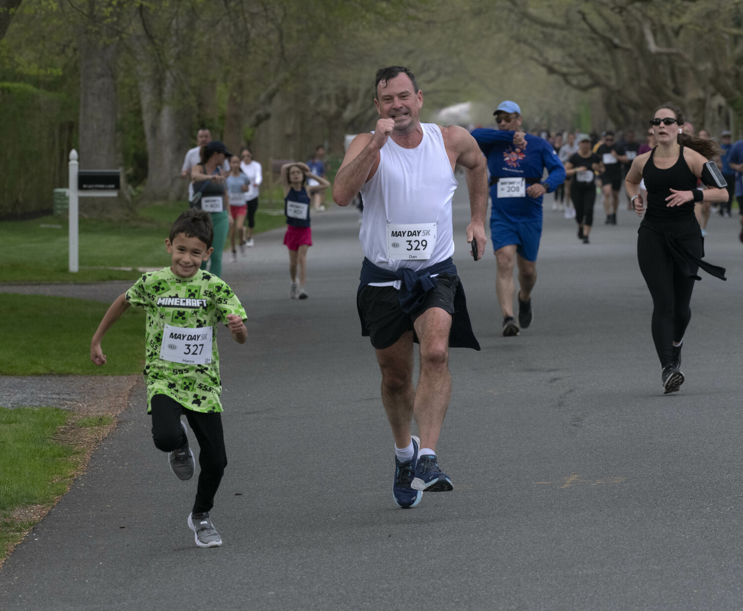 Marco and Dan Gettings race down Lily Pond Lane. DOUG KUNTZ