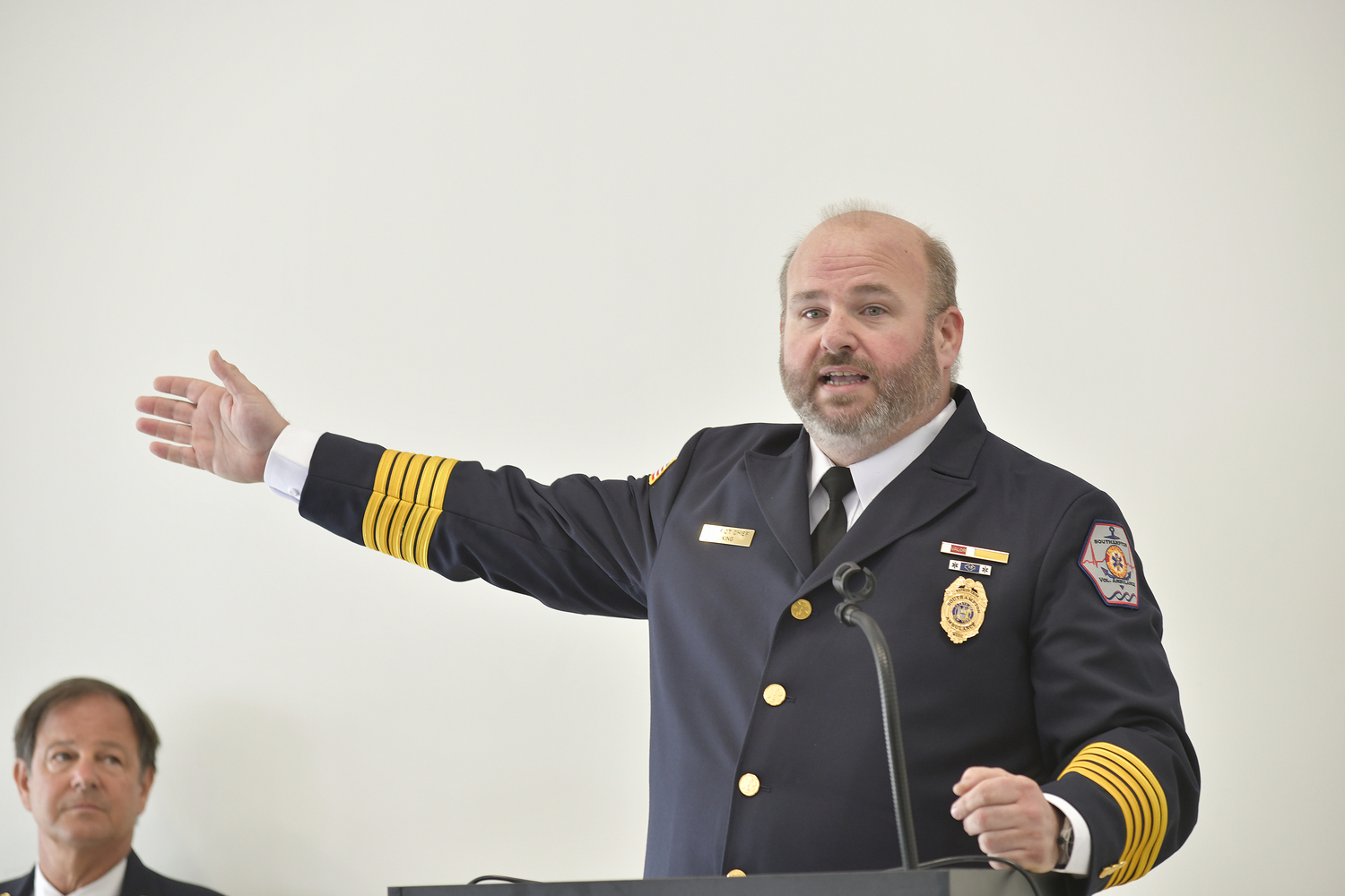 Southampton Volunteer Ambulance  District Chief Ian King speaks to the crowd.  DANA SHAW