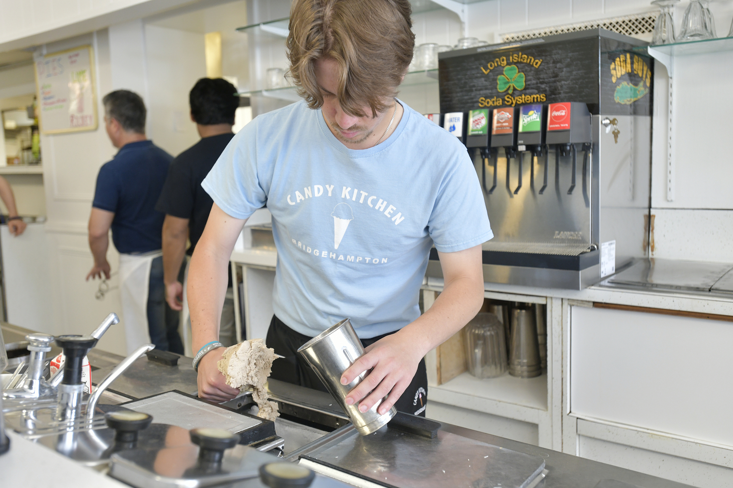 Kris vinski prepares a milkshake at the Candy Kitchen in Bridgehampton on Sunday.  DANA SHAW