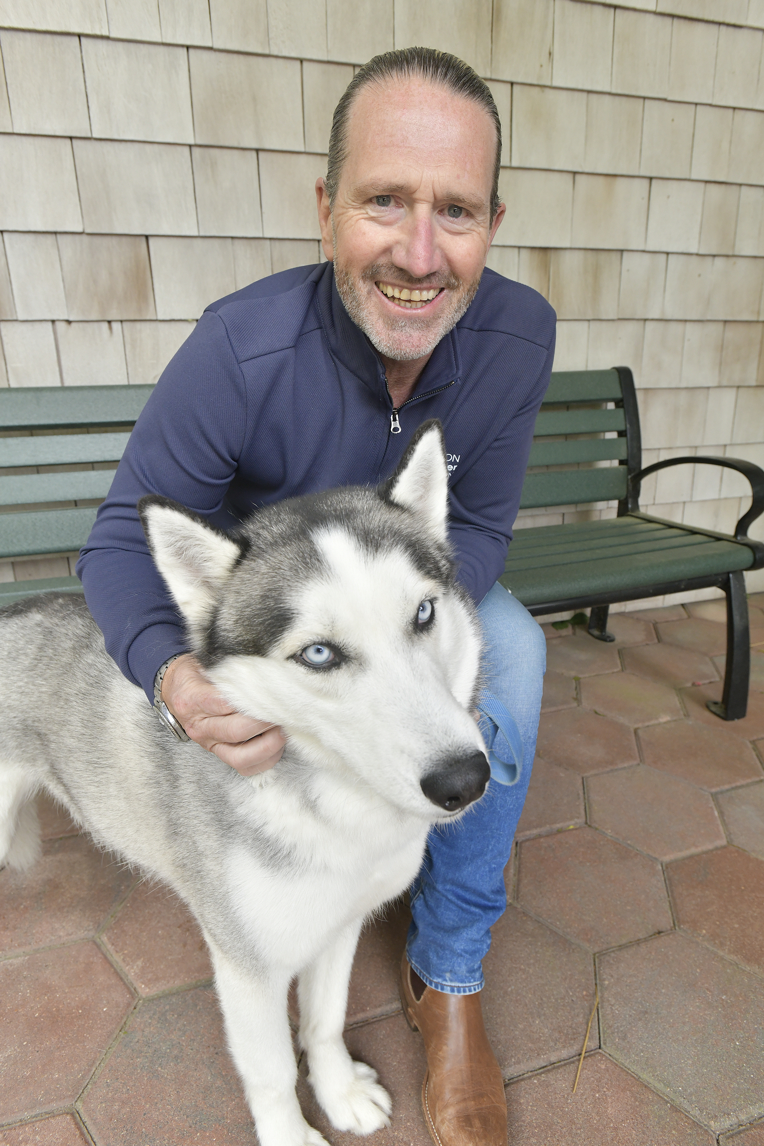 Southampton Animal Shelter Foundation Executive Director Chris Teakle with Bobby.  DANA SHAW