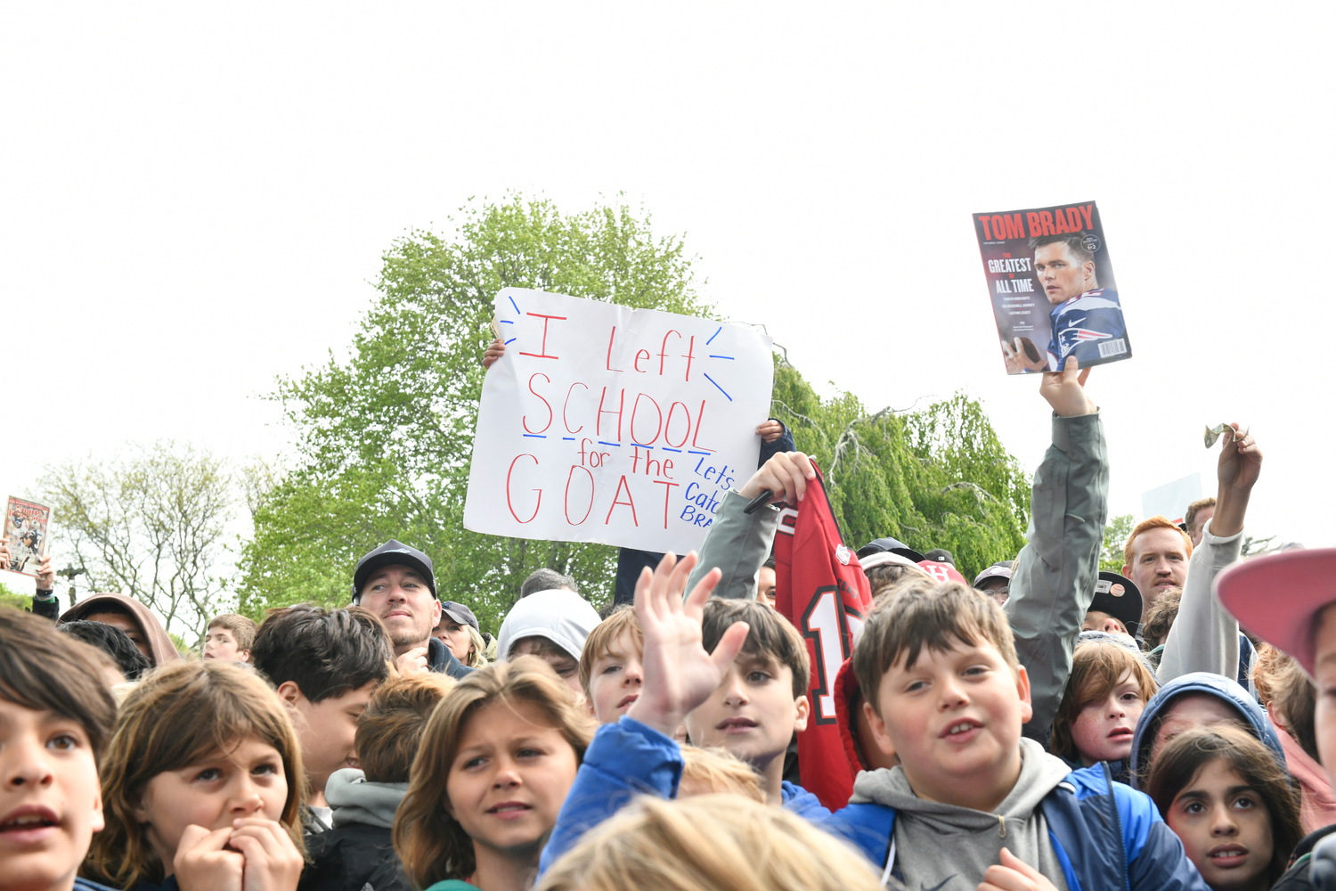 Many fans held up signs and memorabilia.   DANA SHAW