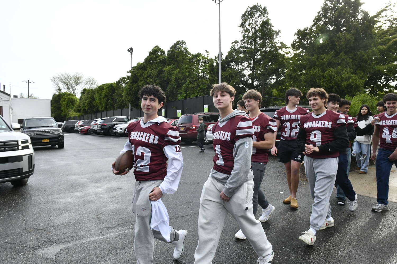The Bonac football team makes it way to the CardVault by Tom Brady.  DANA SHAW